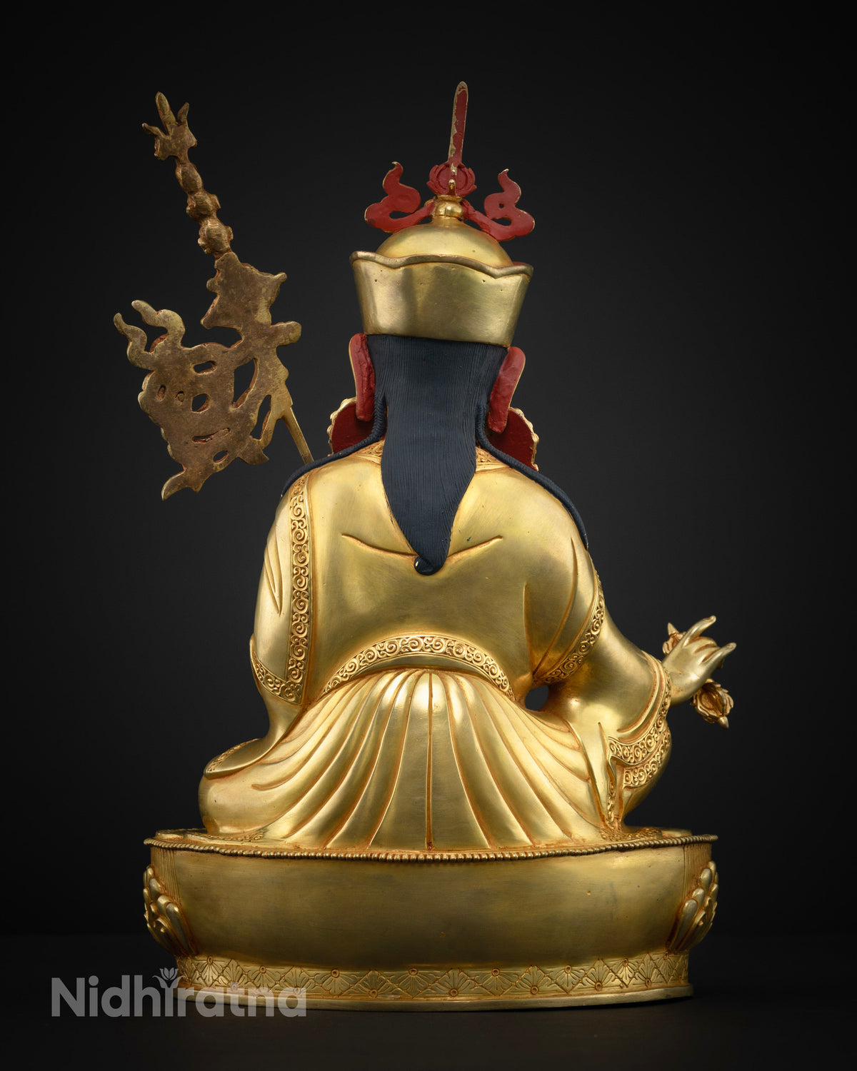 Back view of Guru Rinpoche statue showing hand-chased robe details and Newari craftsmanship from Nepal