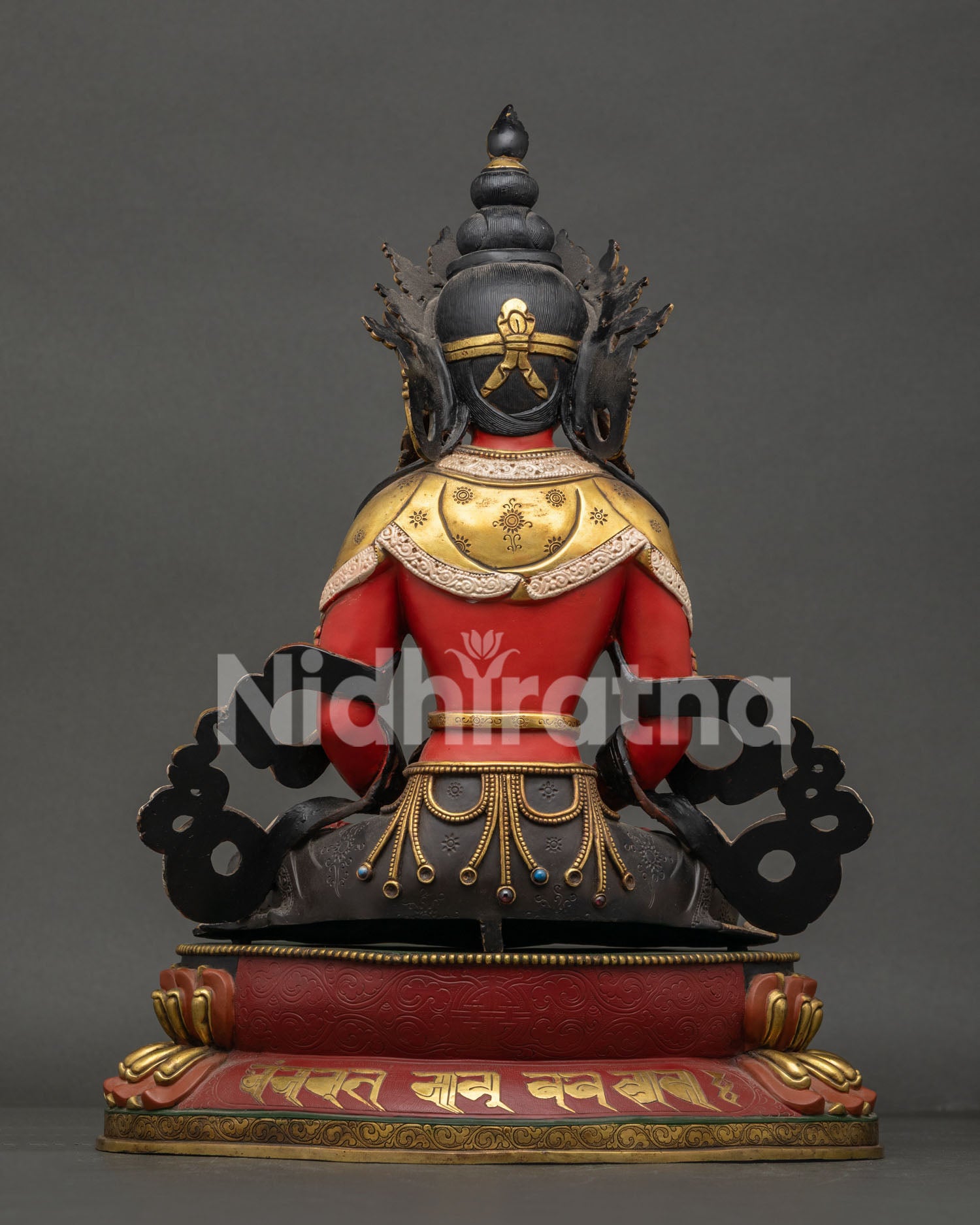 Back view of handcrafted Amitayus Statue showcasing intricate robes, silver plating and lotus pedestal