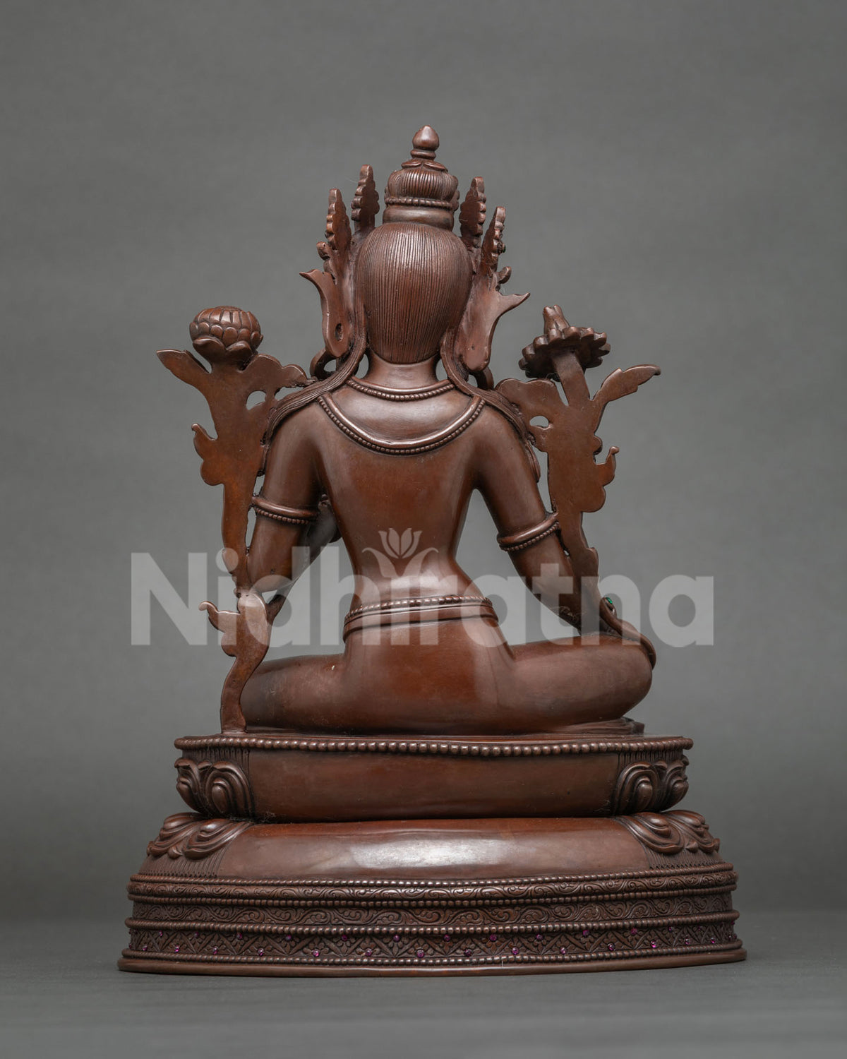 Back view of handcrafted copper Tibetan Green Tara statue for altar