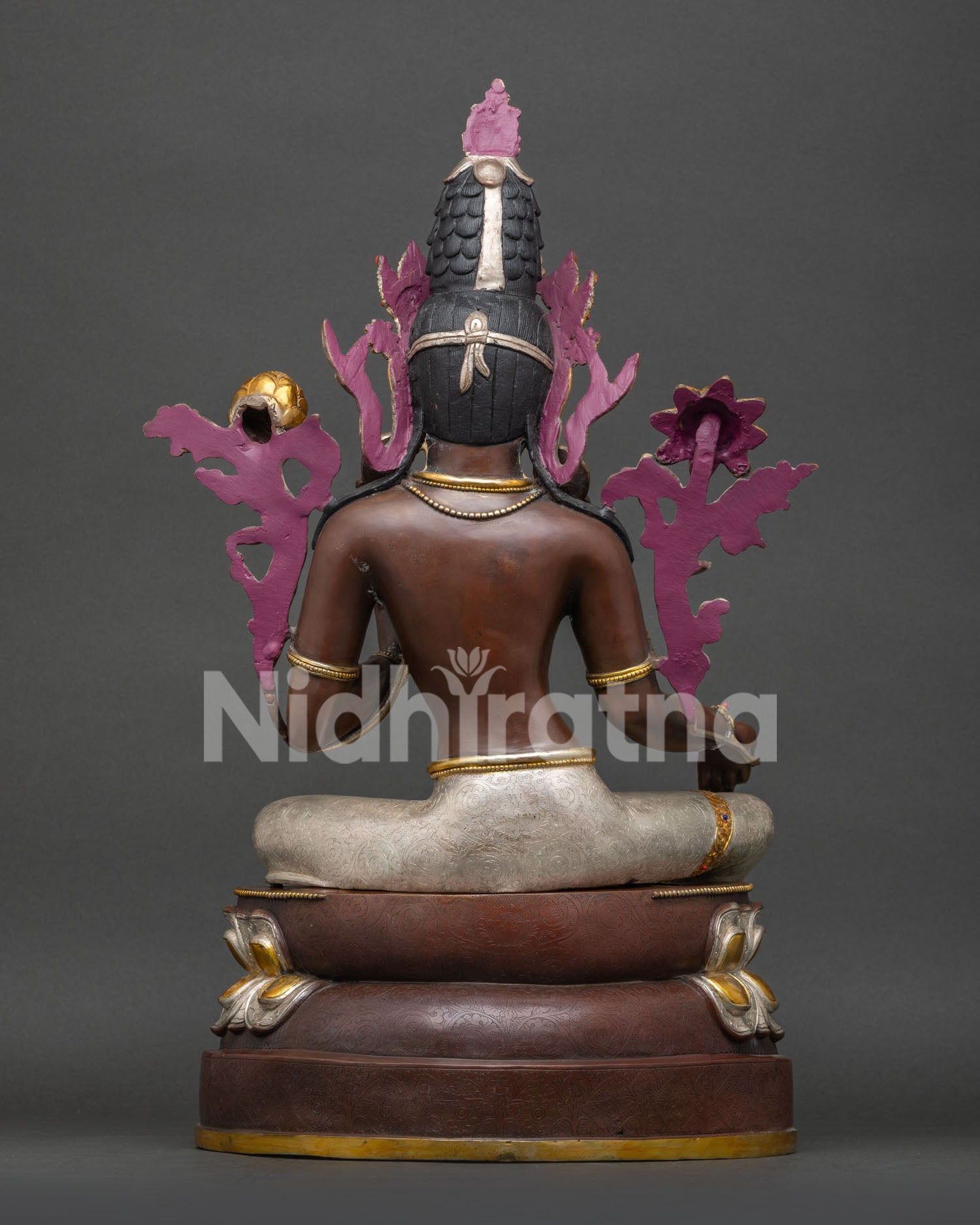 Back view of handcrafted Green Tara statue crafted in oxidized copper
