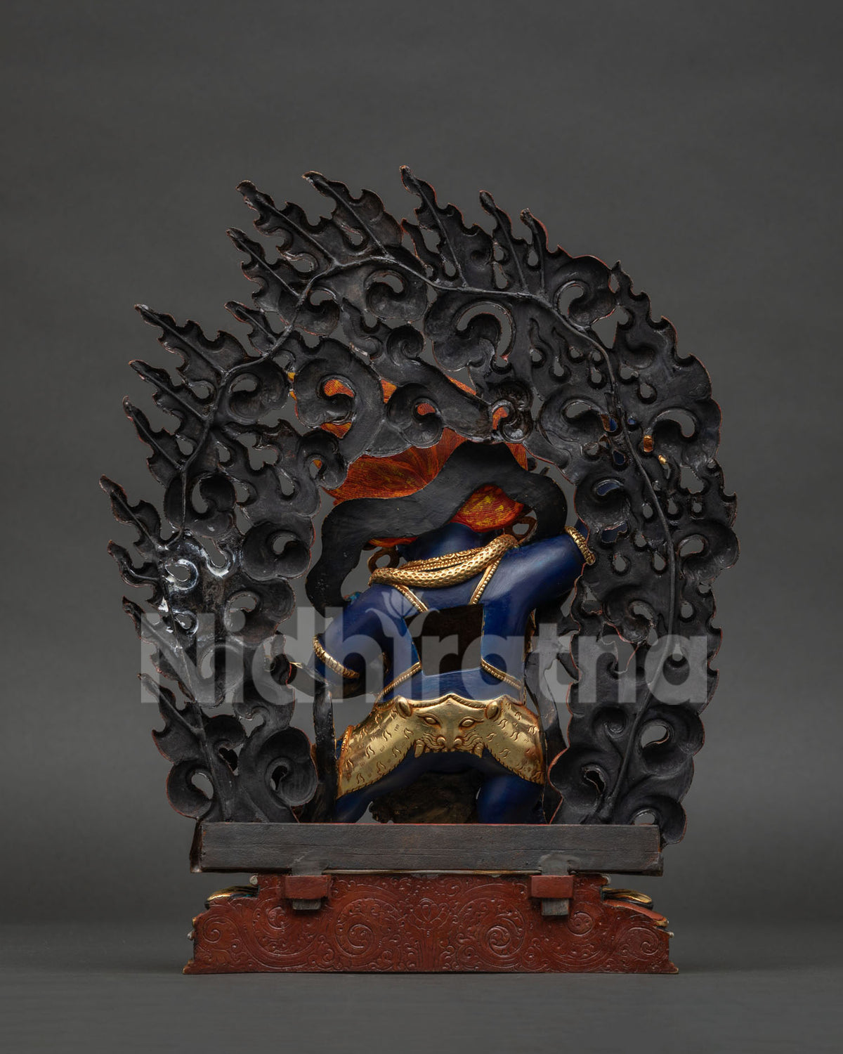Back view of handcrafted Nepal Vajrapani statue with detailed robes and gold gilding