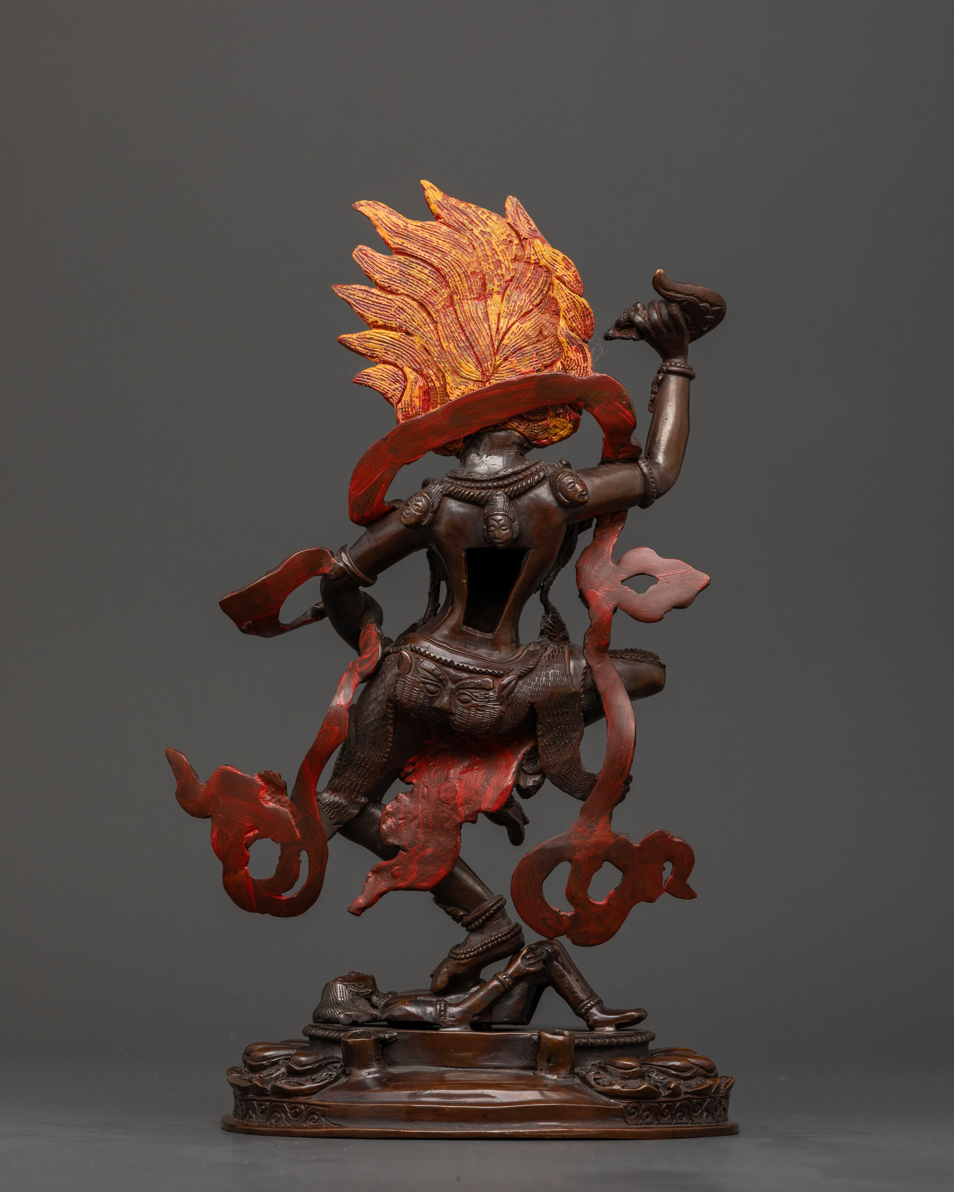 Back view of handcrafted Nepalese Simha Mukha statue with intricate metalwork details