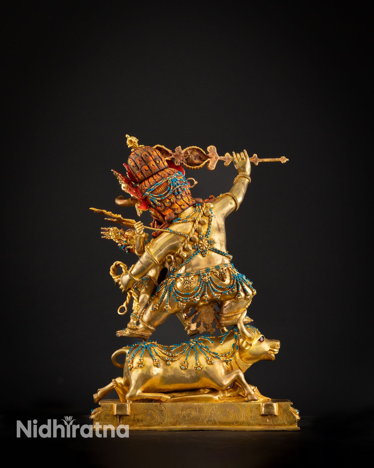 Back view of handmade Yamantaka statue crafted by Newari artisan using lost wax casting in copper Buddhist ritual sculpture from Nepal.
