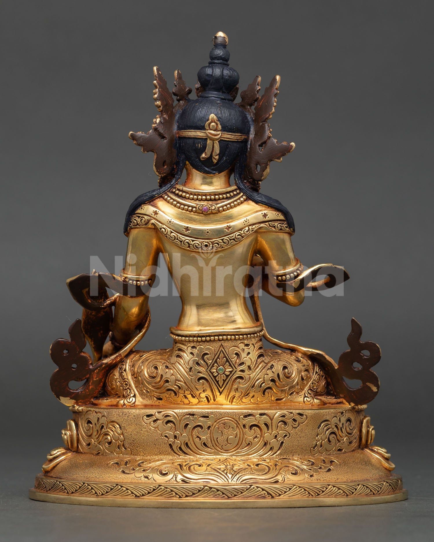 Back view of Jizo Ksitigarbha Statue with detailed robe carvings and fire-gilded copper finish