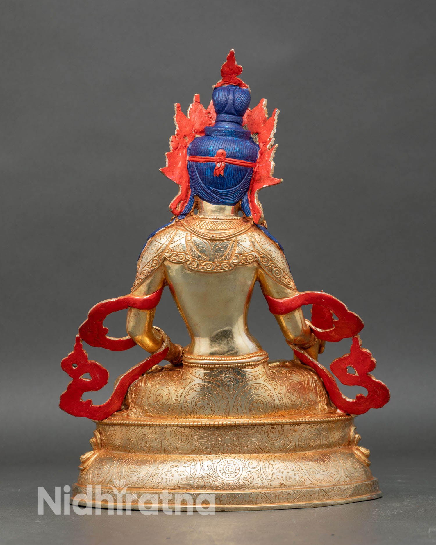Back view of Kshitigarbha statue intricate robes and artisan craftsmanship