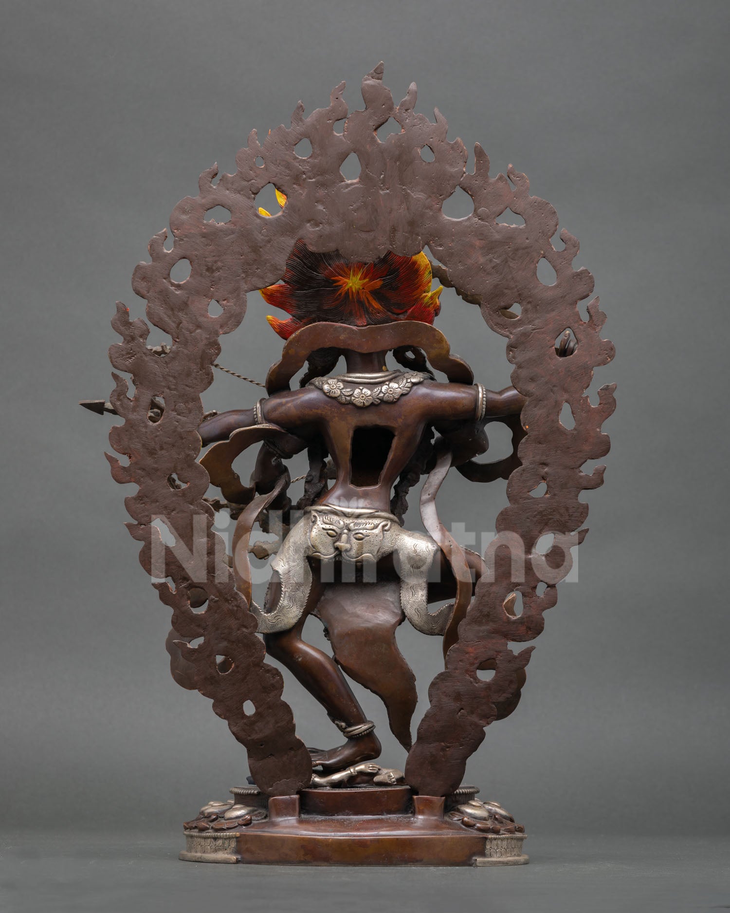 Back view of Kurukulla statue, handcrafted copper sculpture with aged patina finish