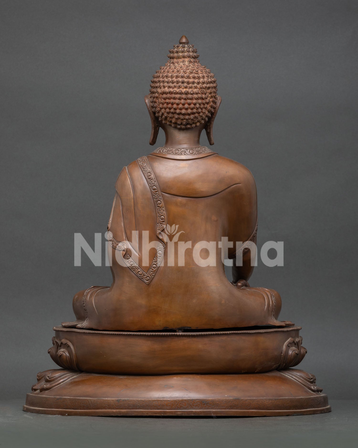 Back view of Shakyamuni Buddha statue, oxidized copper, Newari craftsmanship