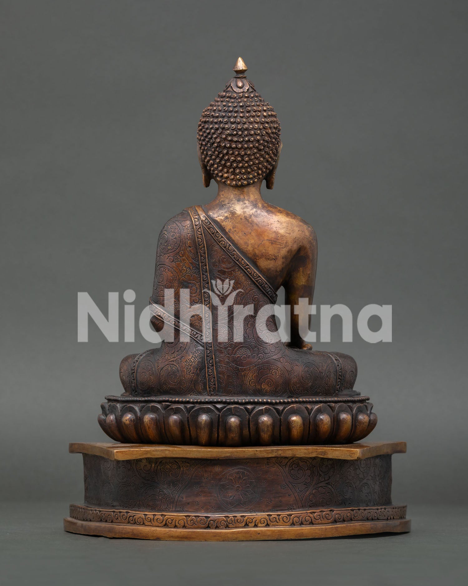 Back view of Shakyamuni Buddha statue showing antique finish and traditional Nepalese craftsmanship