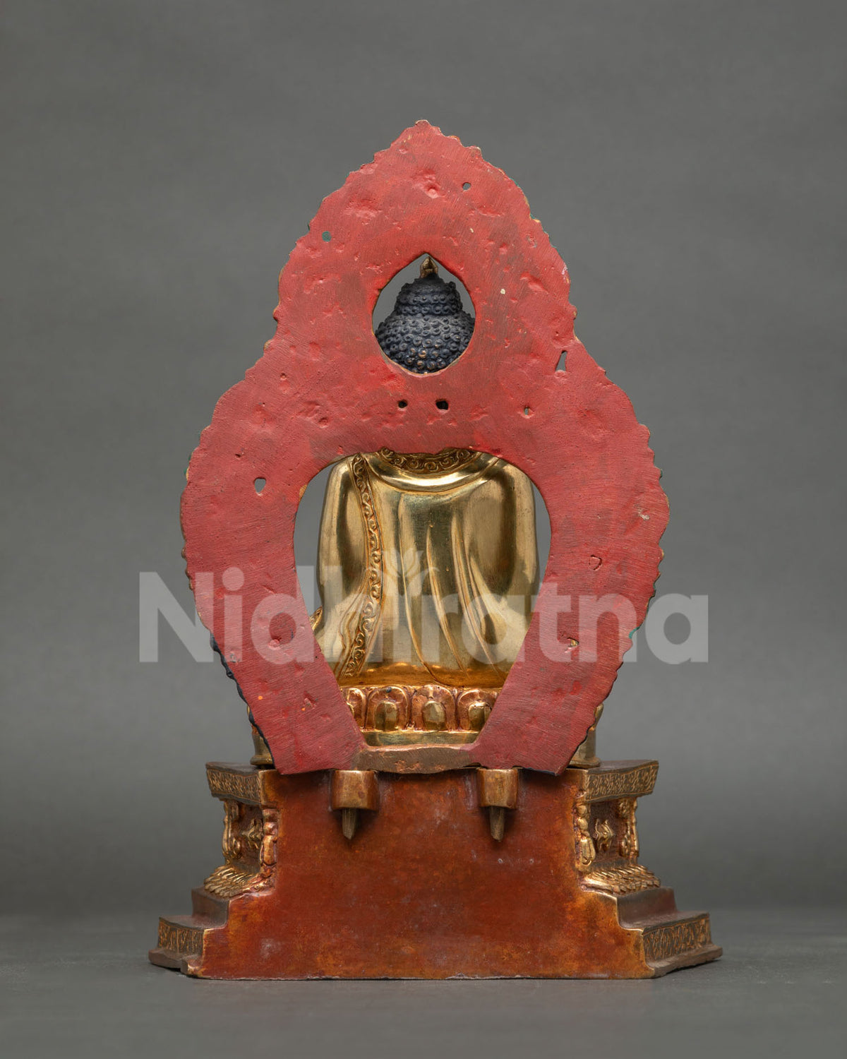 Back View of Shakyamuni Buddha Statue with Vividly Colored Halo