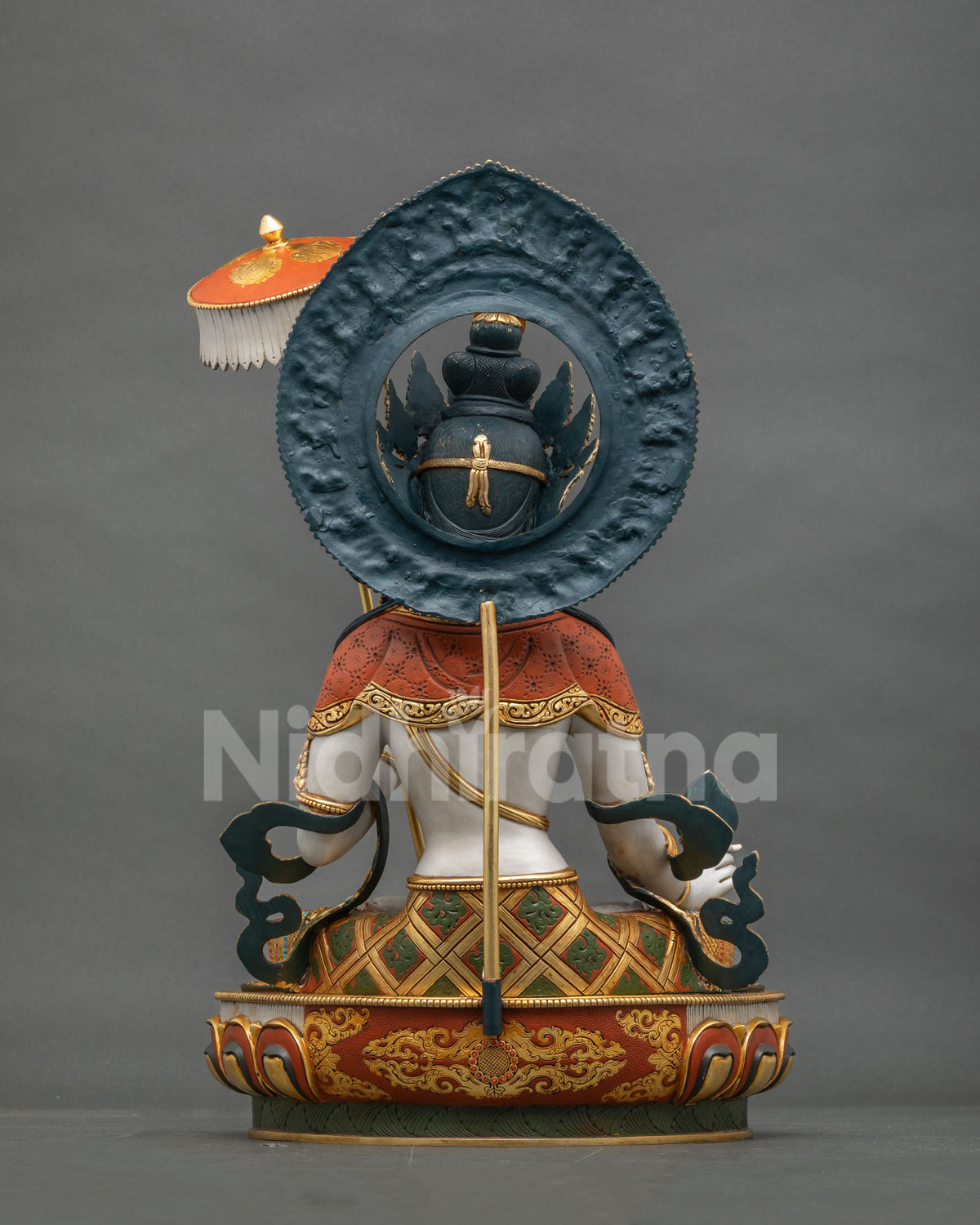 Back view of Sitatapatra Dukkar statue showing white parasol and halo, handcrafted copper art from Nepal