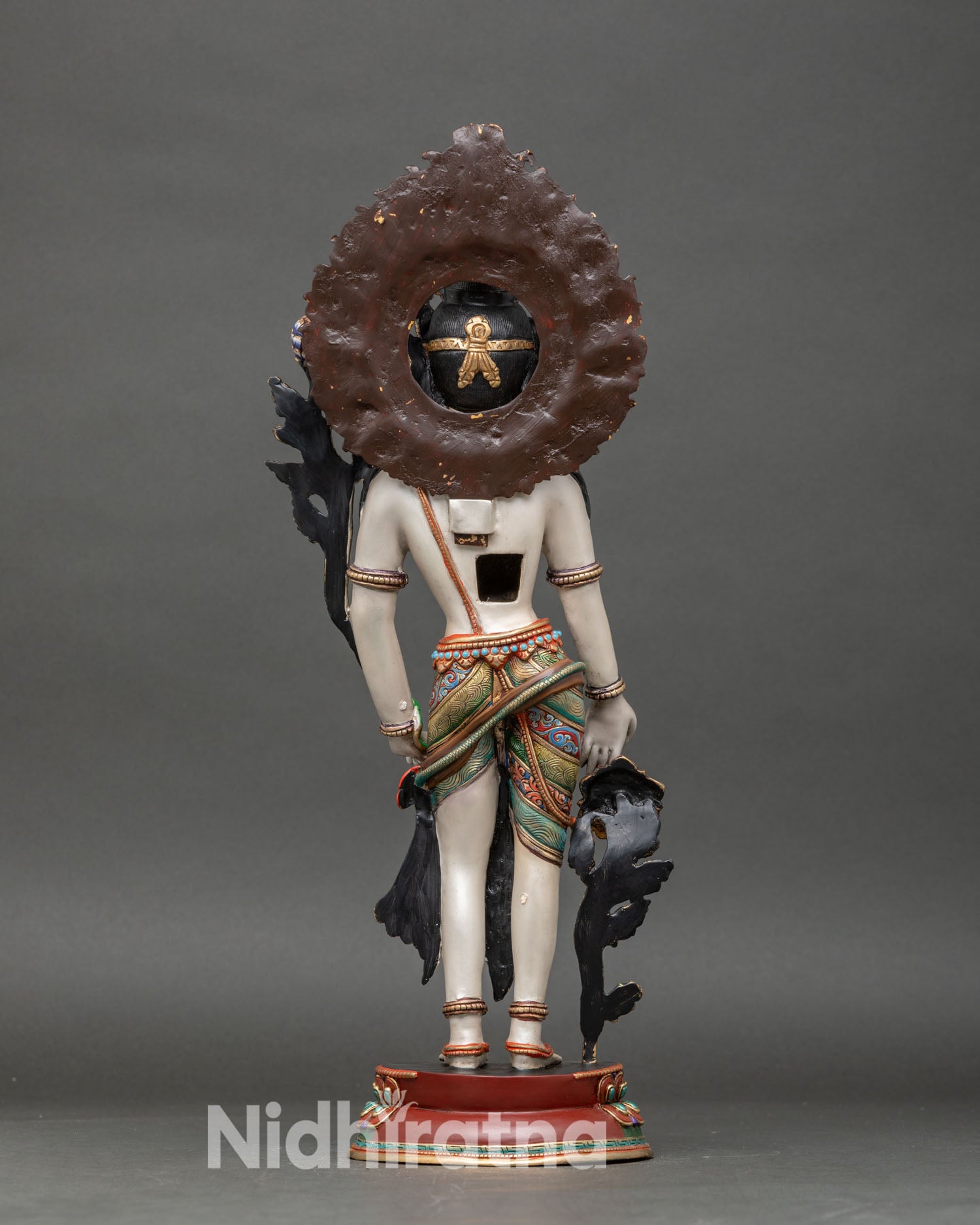 back view of standing chenrezig statue with detailed halo and hand-painted designs