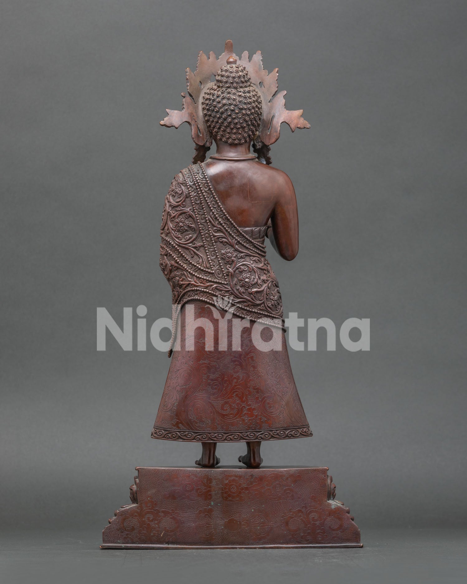 Back view of the authentic Himalayan Dipankara-Buddha statue, handcrafted using the traditional lost-wax casting method in Nepal.