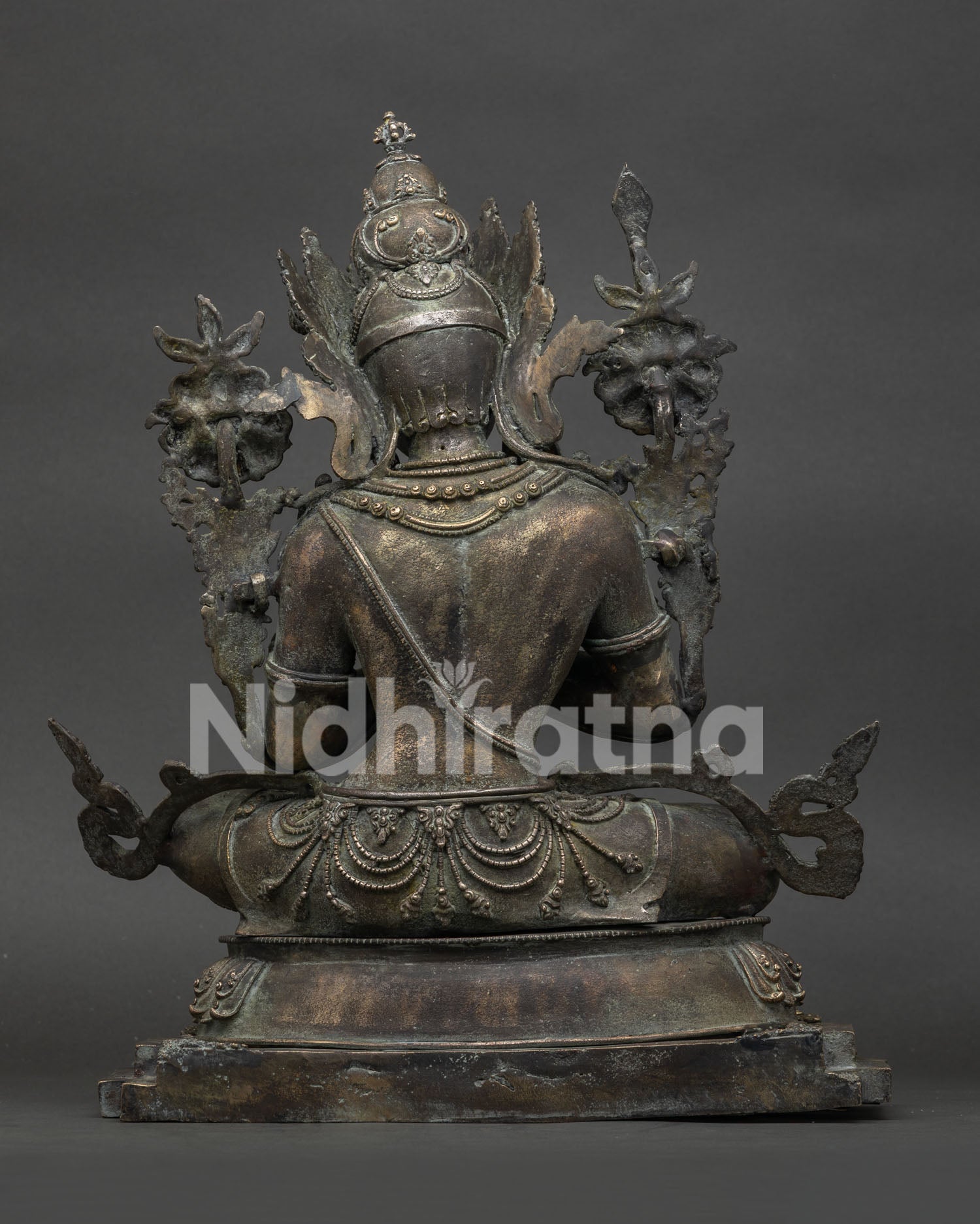back view of tikshna manjushri bronze statue with antique finish