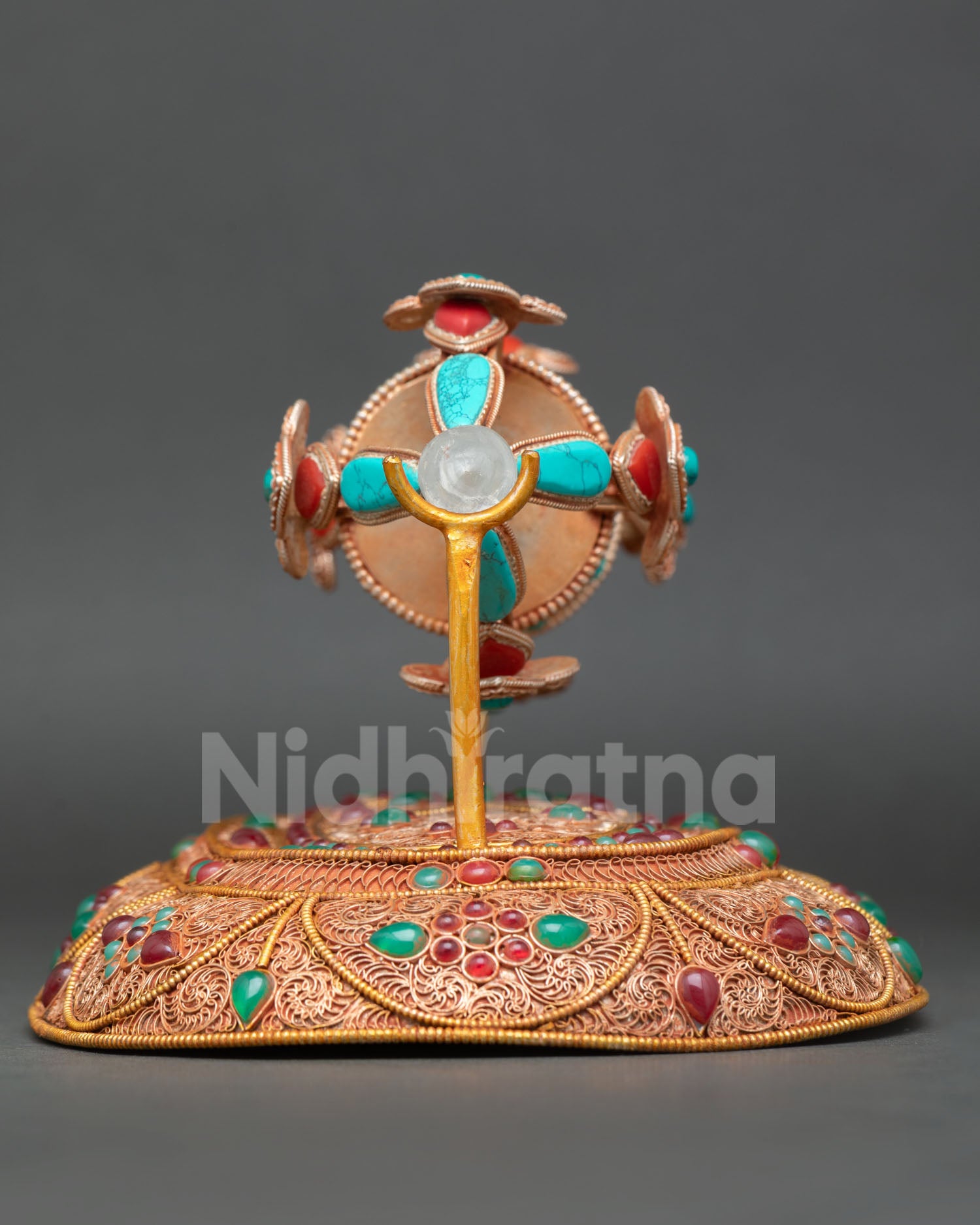 back view of vajra dorje with stand showcasing intricate metalwork and traditional nepali artisan detailing