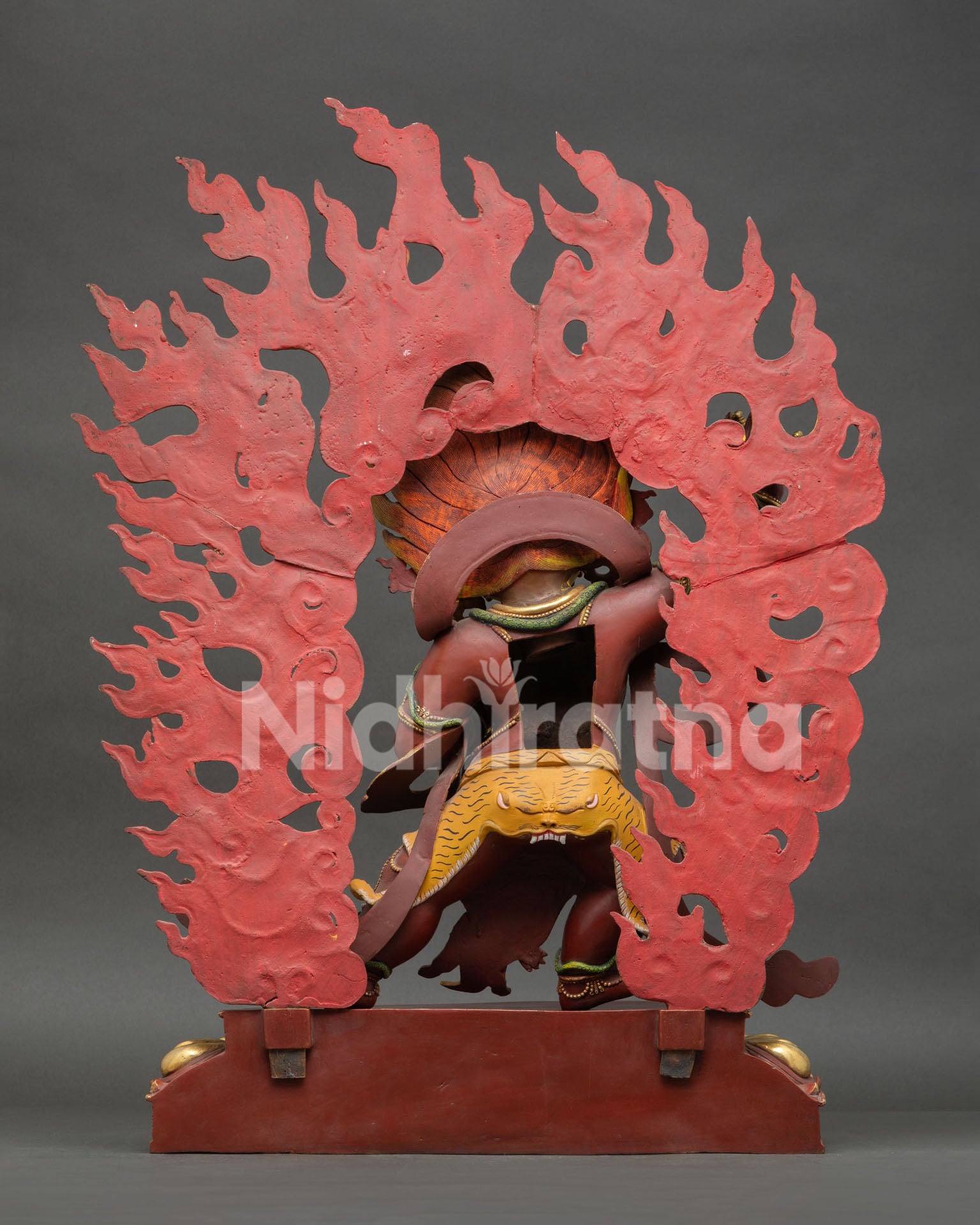 Back view of Vajrapani statue displaying handcrafted copper details, traditional Buddhist artwork, and ornate design
