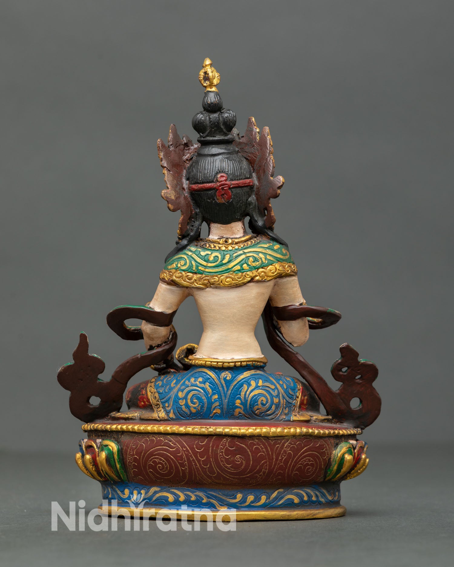 Back view of Vajrasattva sacred statue from Patan Nepal showing traditional Himalayan craftsmanship copper metalwork and detailed hand finished artistry