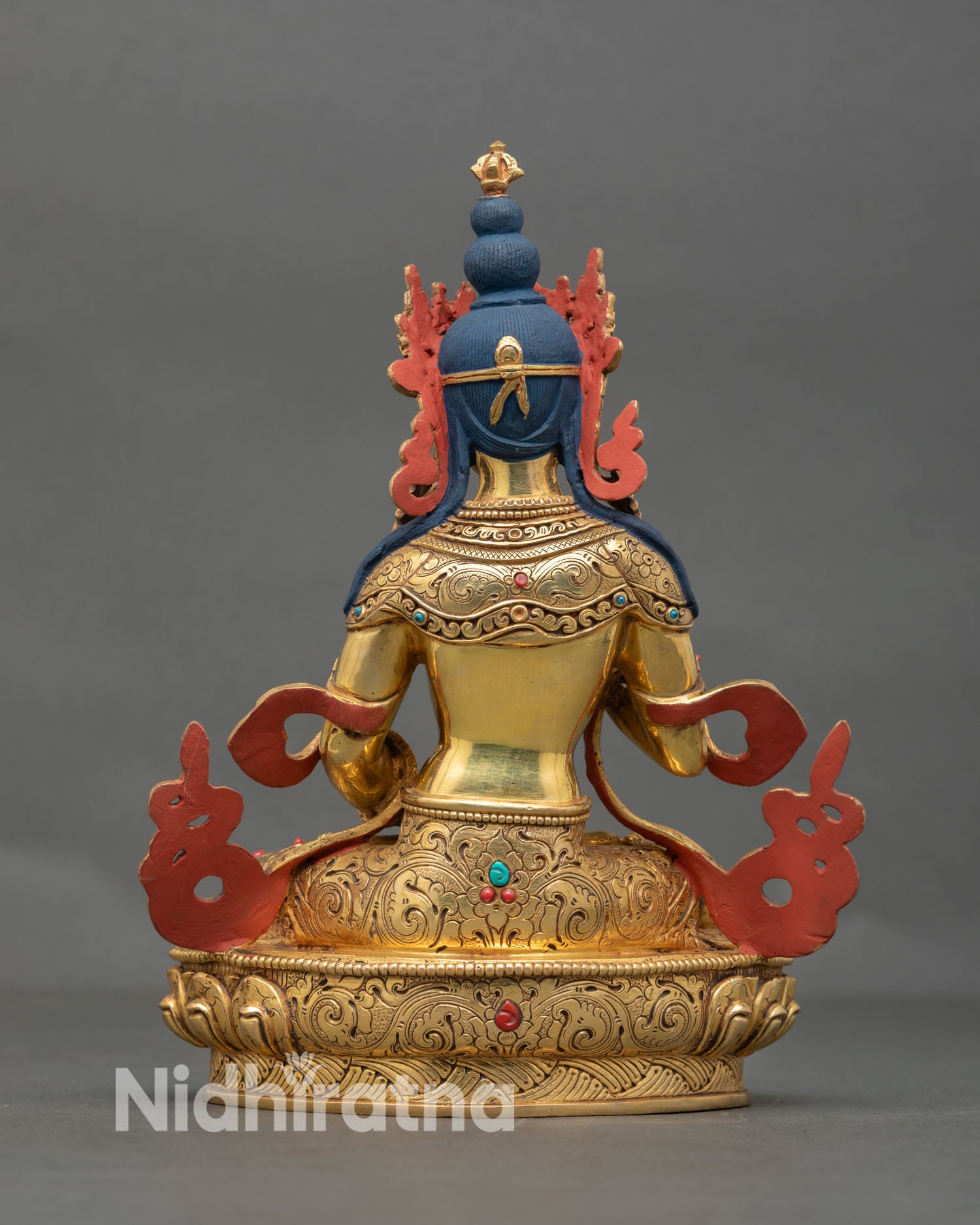 Back view of Vajrasattva statue highlighting intricate lost wax casting craftsmanship, copper detailing, and traditional Nepalese spiritual sculpture design