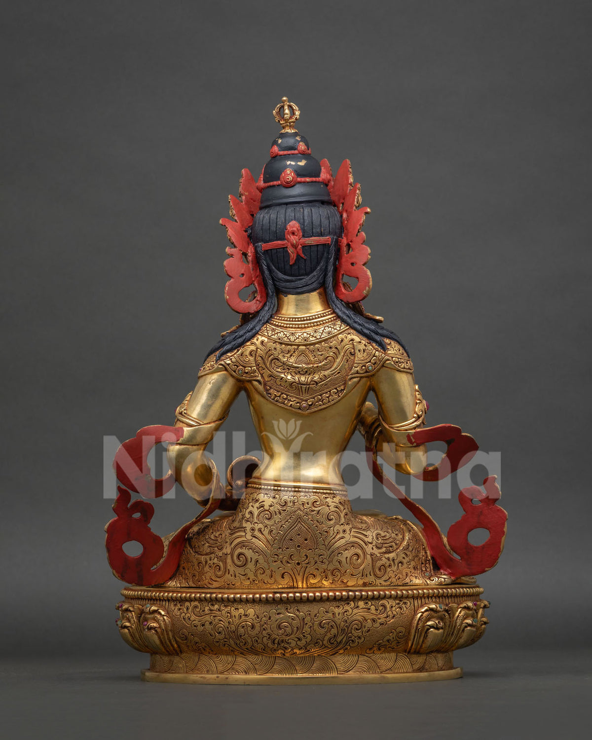 Back view of Vajrasattva Statue showing crown, hair detail and lotus pedestal