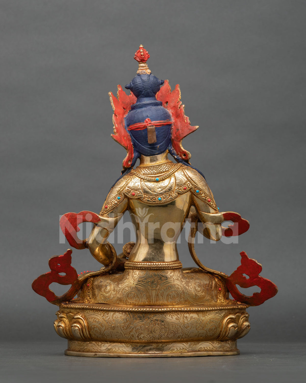 Back view of Vajrasattva with blue hair ornament, red flame backing and gilded lotus base