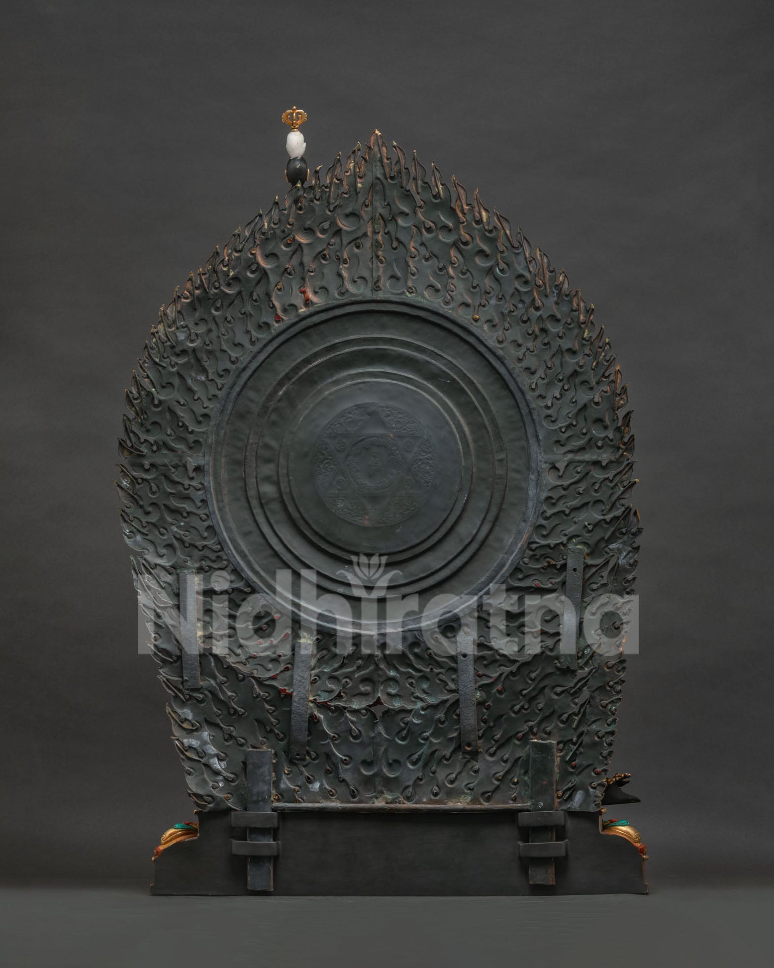 Back view of Vajrayogini statue showing flame halo and lost-wax casting detail