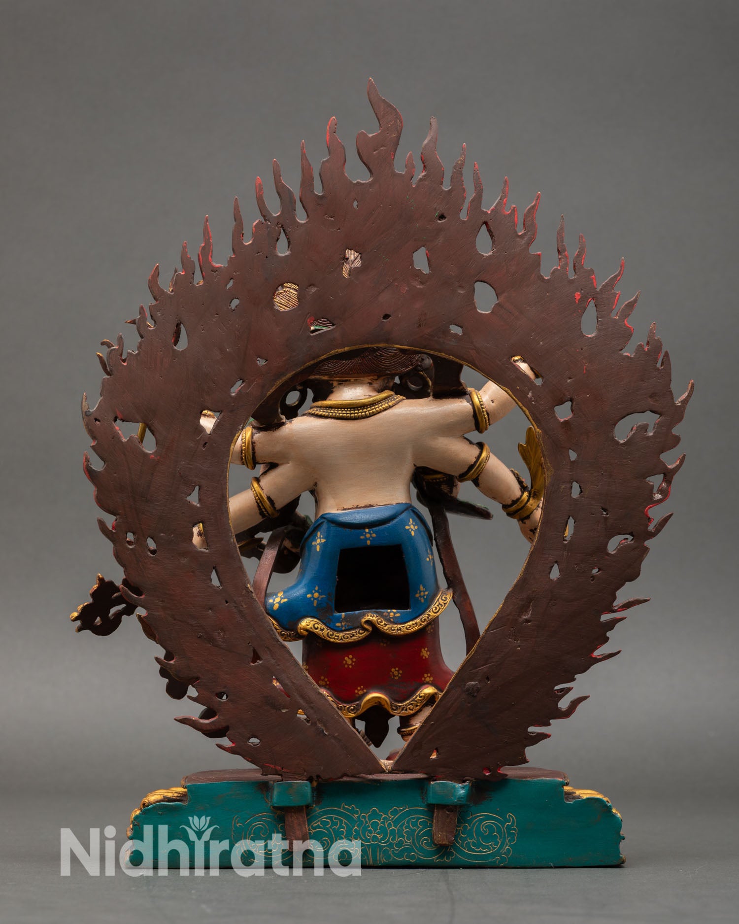 Back view of White Mahakala statue handcrafted copper gold gilded sacred Tibetan deity