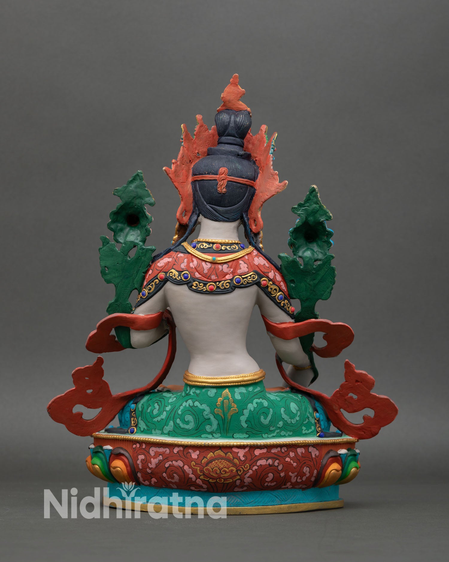 Back view of White Tara statue showing copper craftsmanship, gold details, and traditional Nepalese altar art