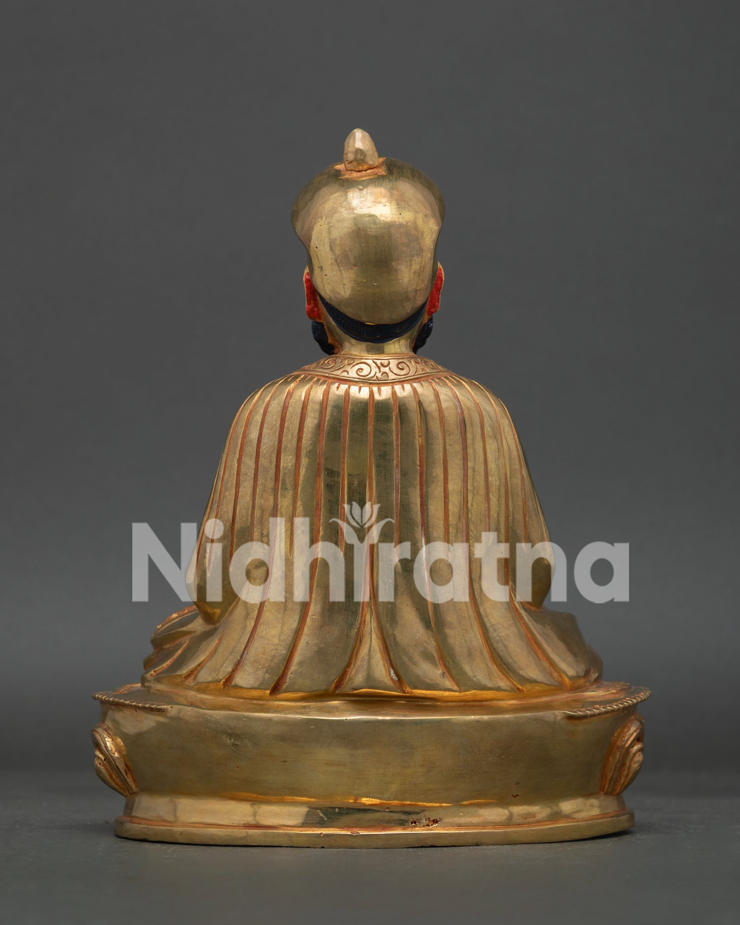 Back view of Zhabdrung Ngawang Namgyal Statue with intricate hand-carved details