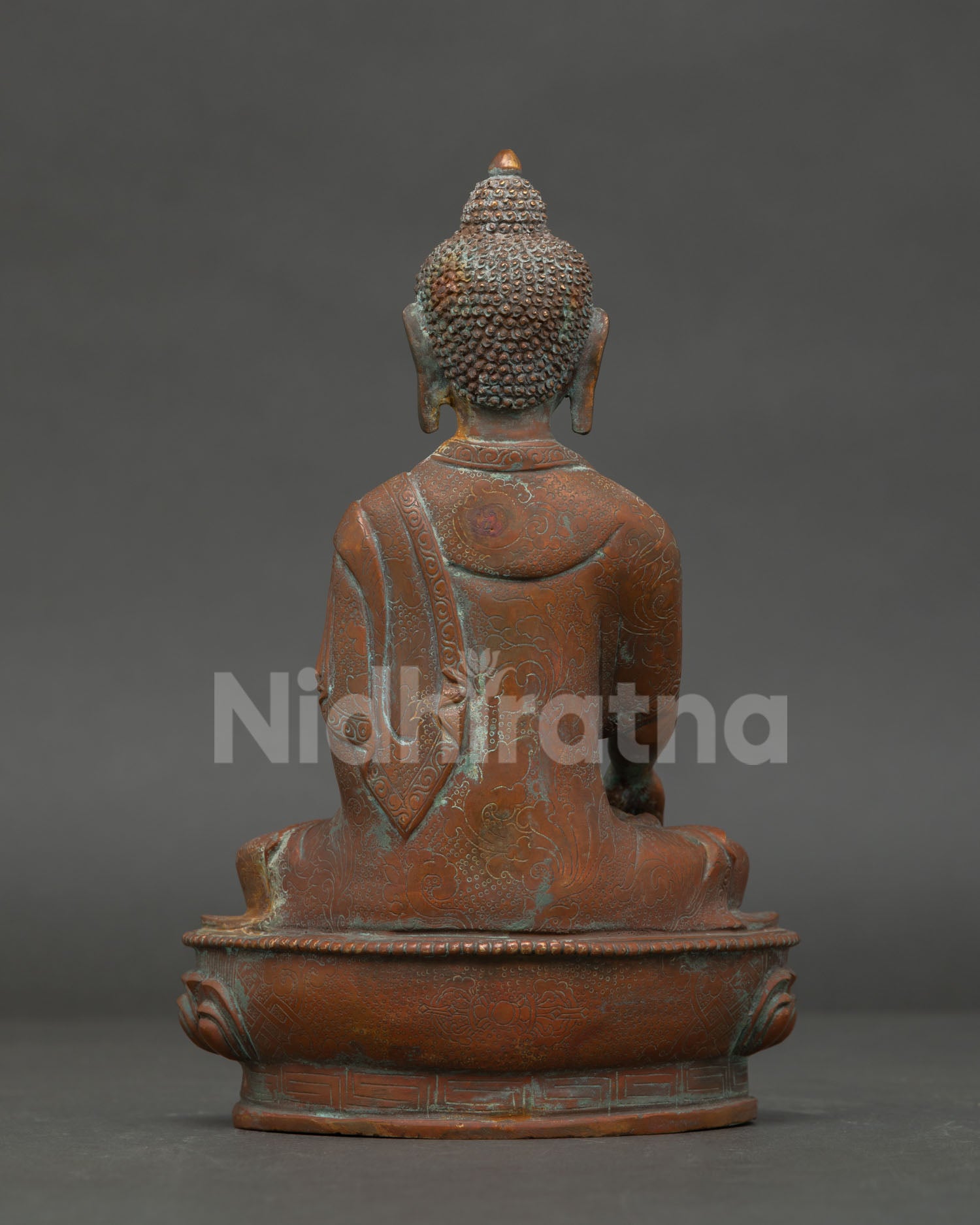back view oxidized shakyamuni buddha statue lotus base engraved details oxidized patina