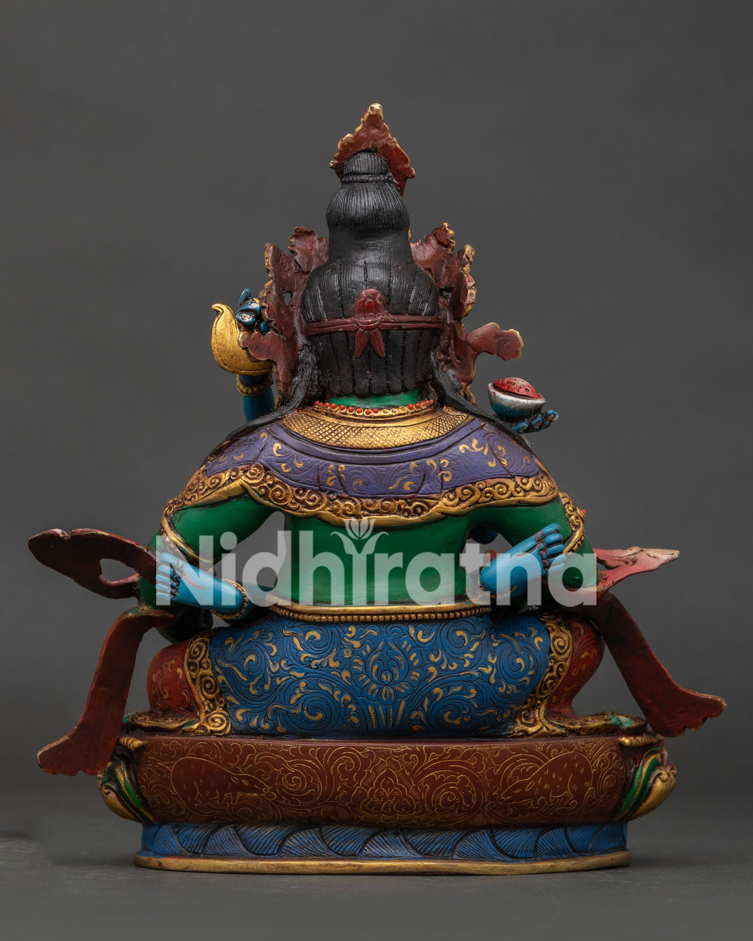 back view reveals the handcrafted lotus seat and halo of the Green Dzambhala statue