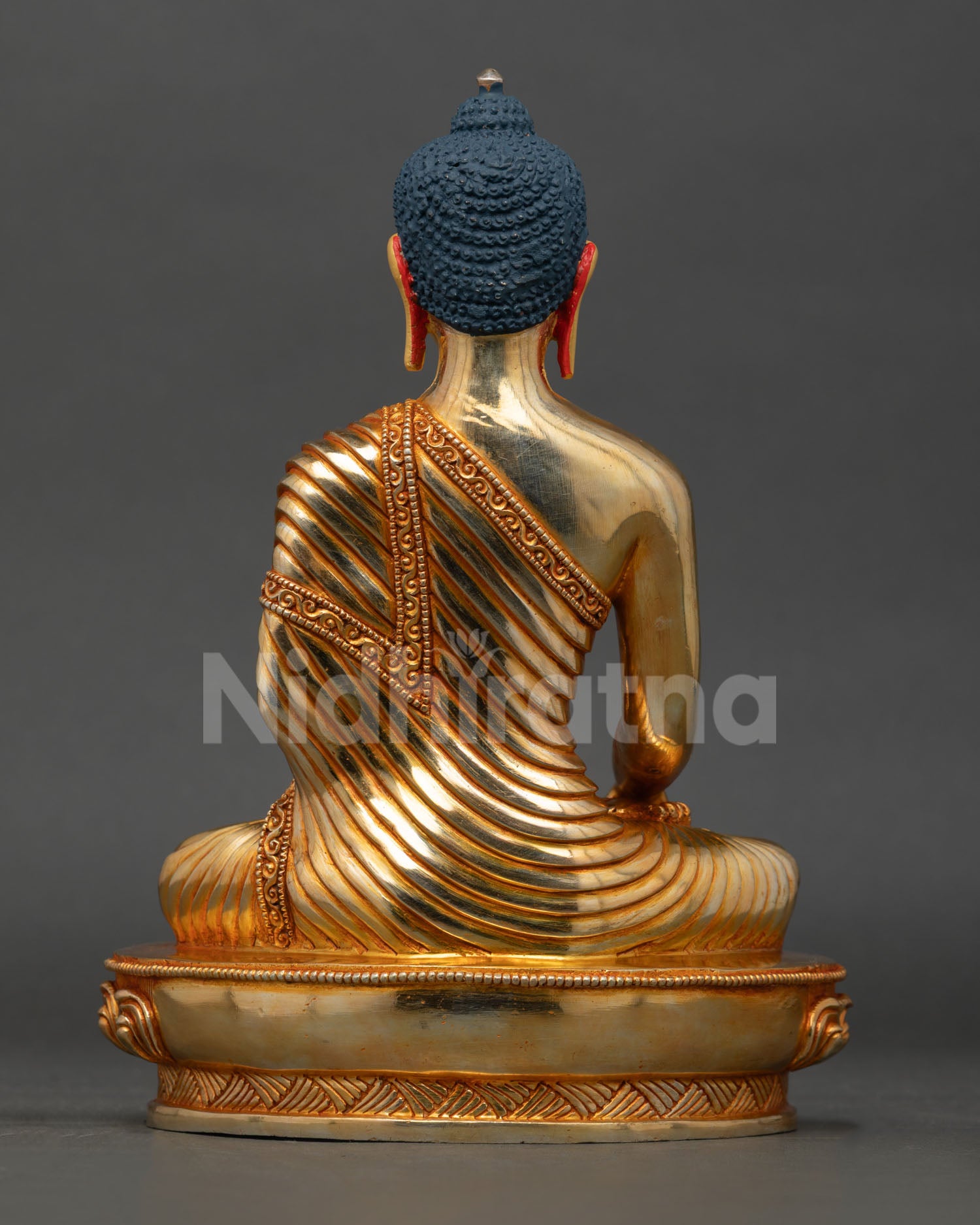 back view shakyamuni buddha statue, detailed robe carving lotus pedestal, copper nepal sculpture