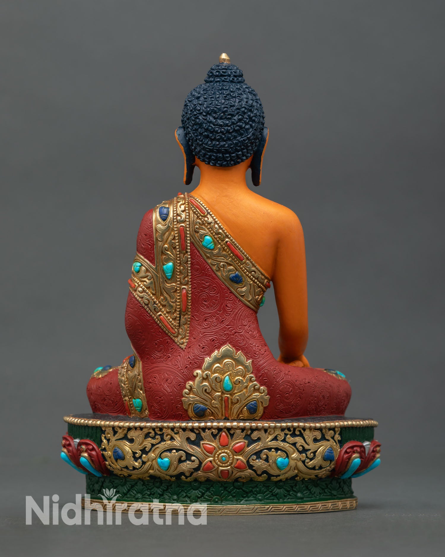 Back view of Shakyamuni Buddha statue lotus throne Newari metalwork craftsmanship sacred Buddha meditation altar home decor Himalayan art