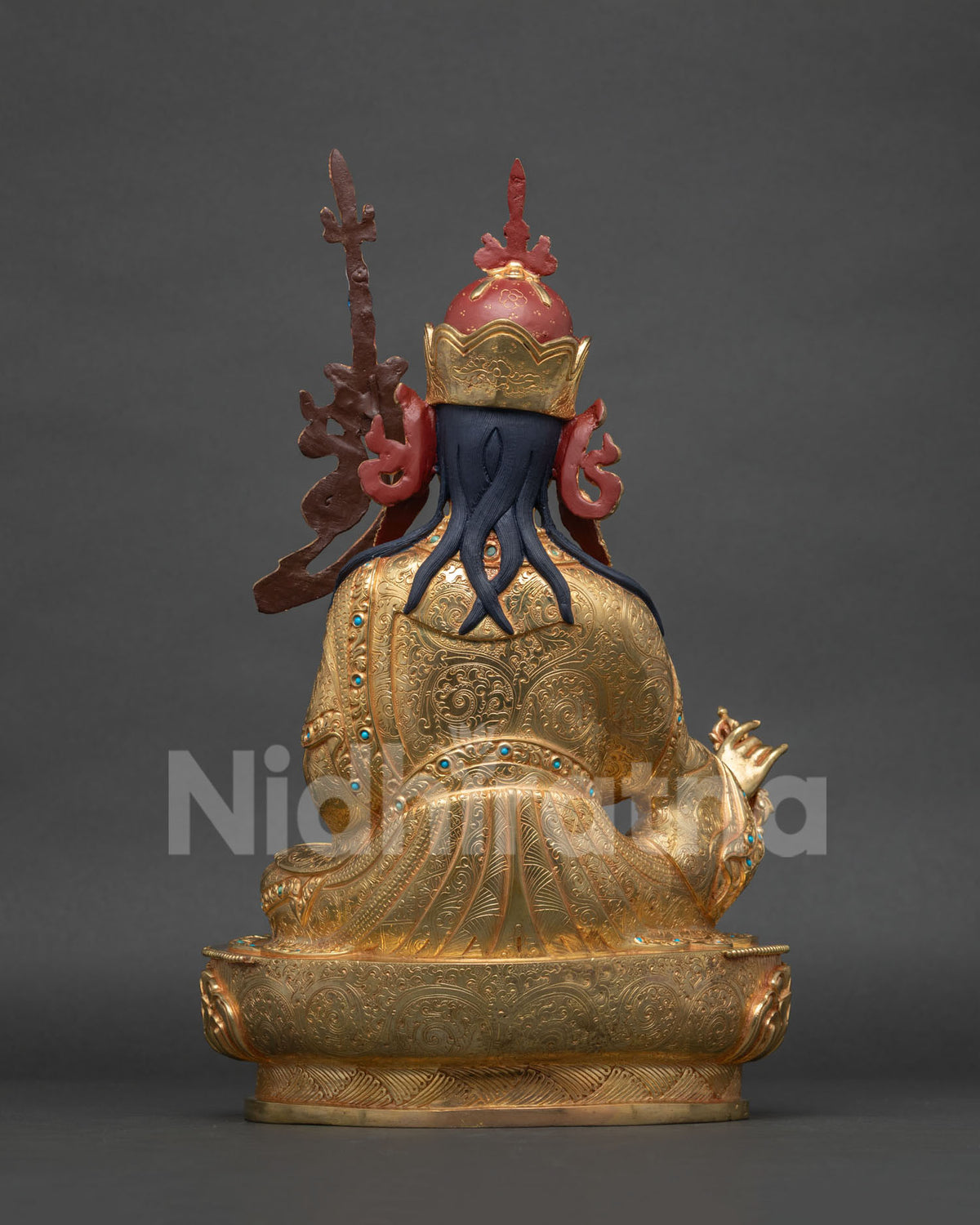 Back view showing carving details of Guru Rinpoche statue