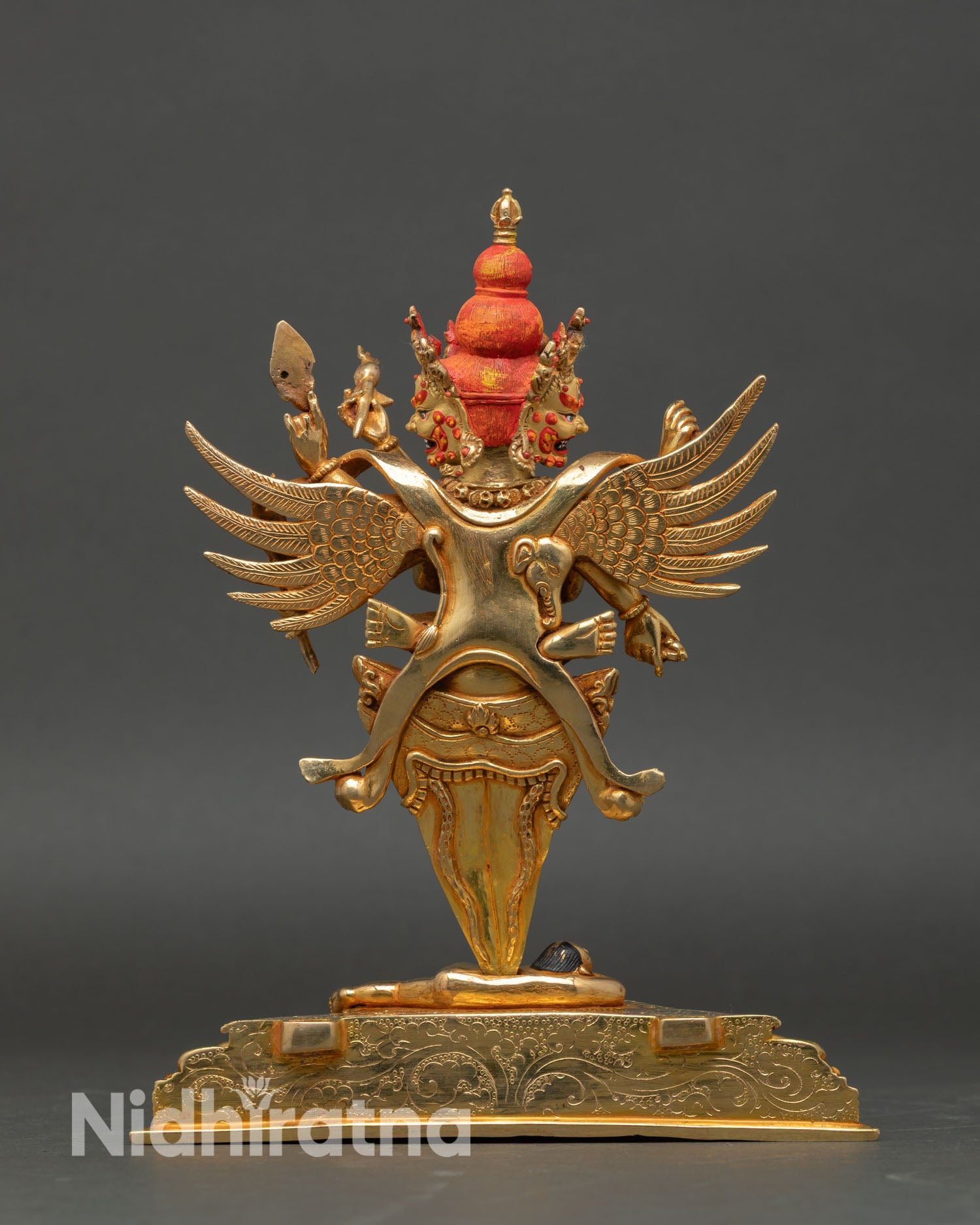 Back view of Vajrakilaya statue, Patan, Nepal handmade copper oxidized gold gilded Vajrayana deity sculpture, sacred altar spiritual decor
