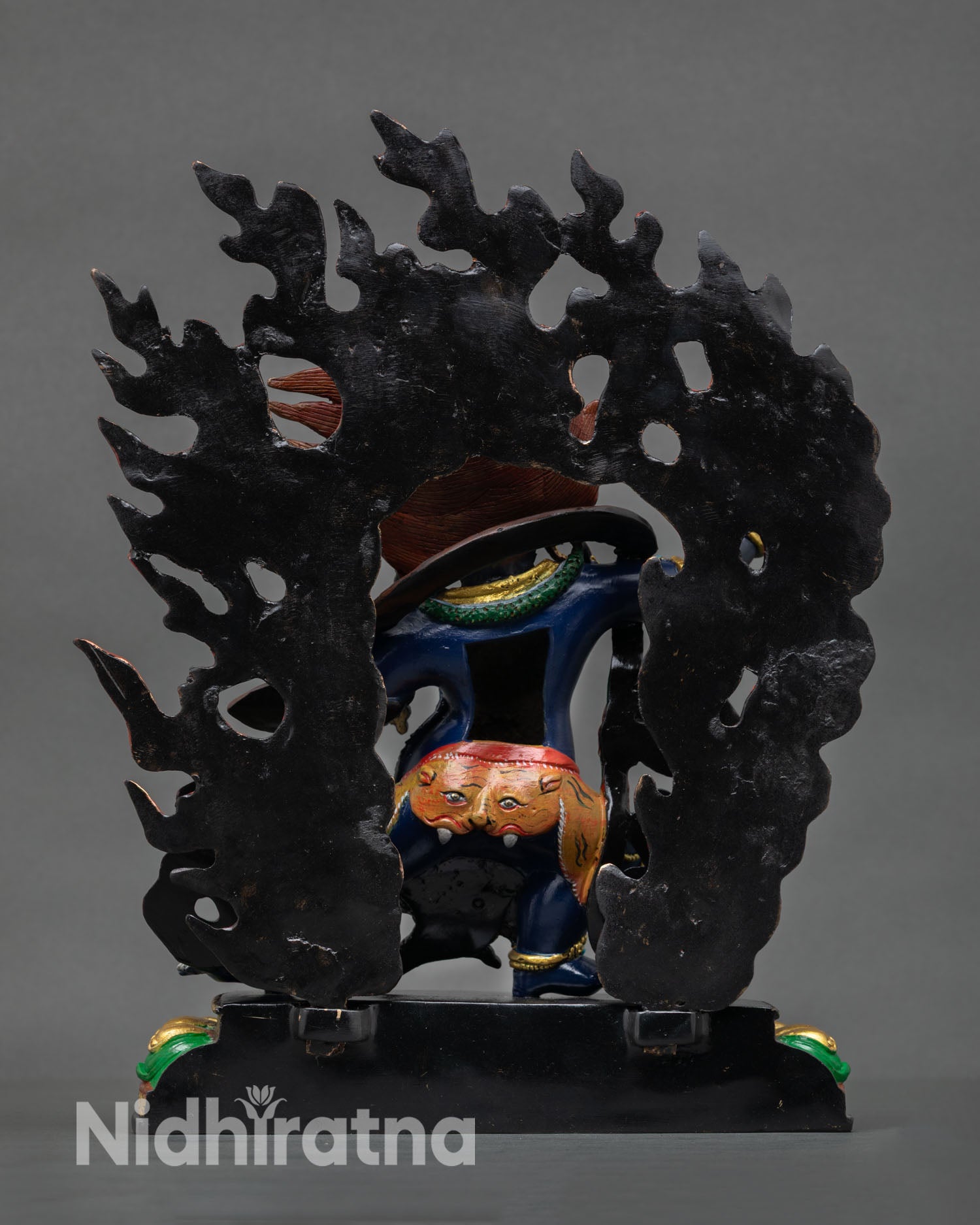 Back view of Vajrapani statue Nepal sculpture copper body detailed flame halo design