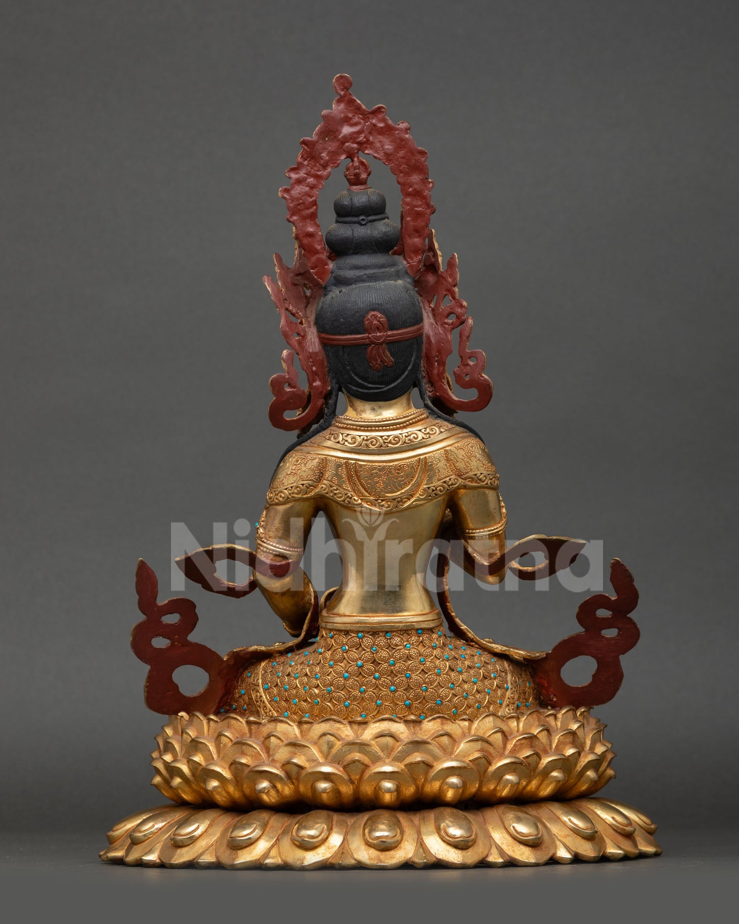 Back view of Vajrasattva statue blooming lotus pedestal detailed ornament work Nepal handmade sacred deity sculpture meditation shrine spiritual decor