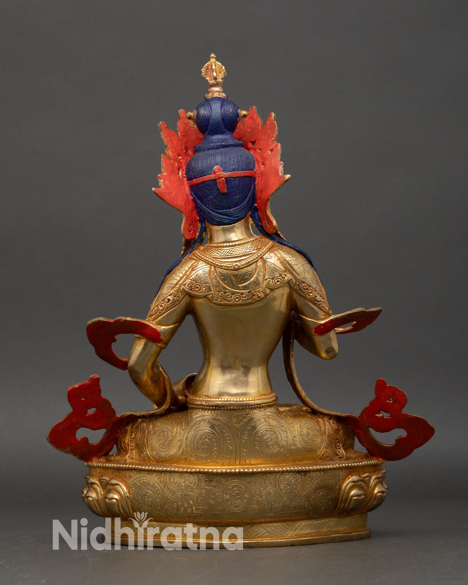 Back view of Vajrasattva statue intricate lotus pedestal copper artwork