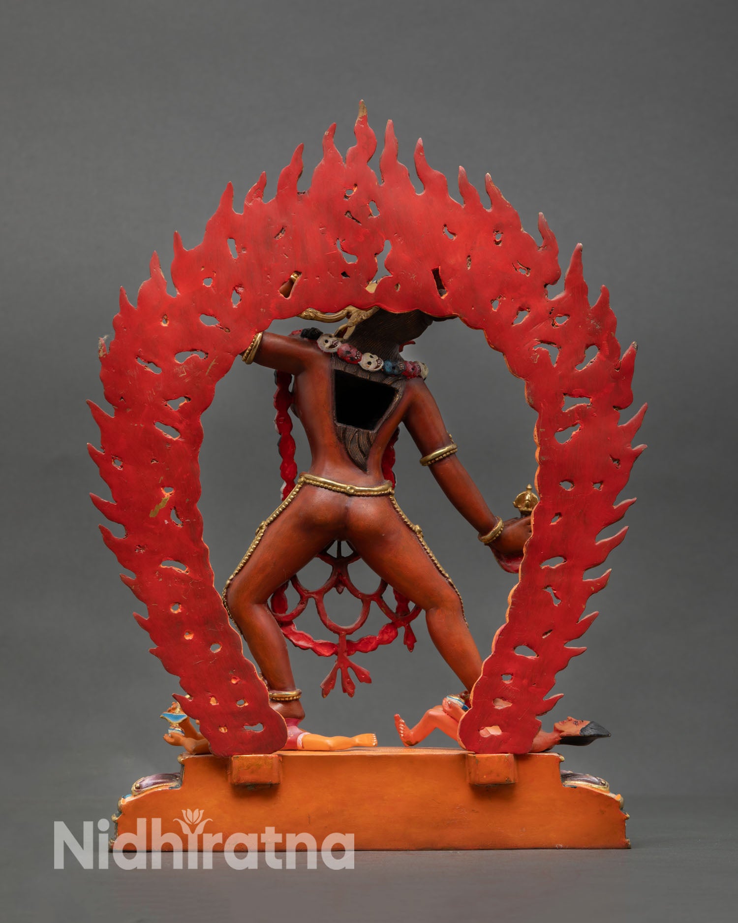 Back view of Vajrayogini statue radiant halo Nepal handmade Buddhist goddess sculpture for home altar decor spiritual awakening