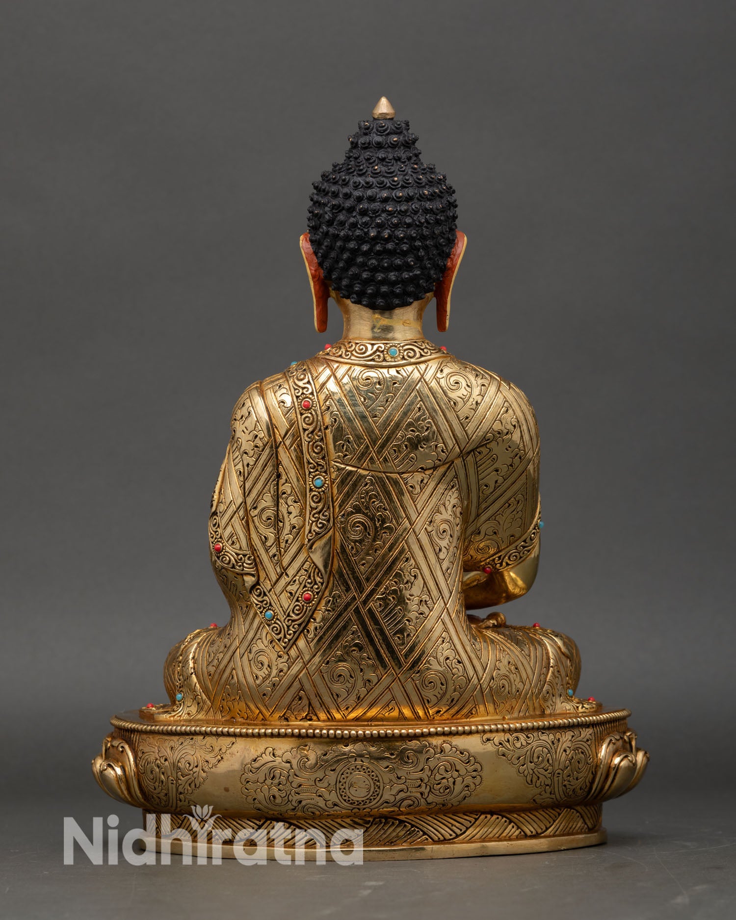 back view, amitabha buddha statue rear detail, finely crafted copper robes and lotus pedestal showcasing traditional nepalese art