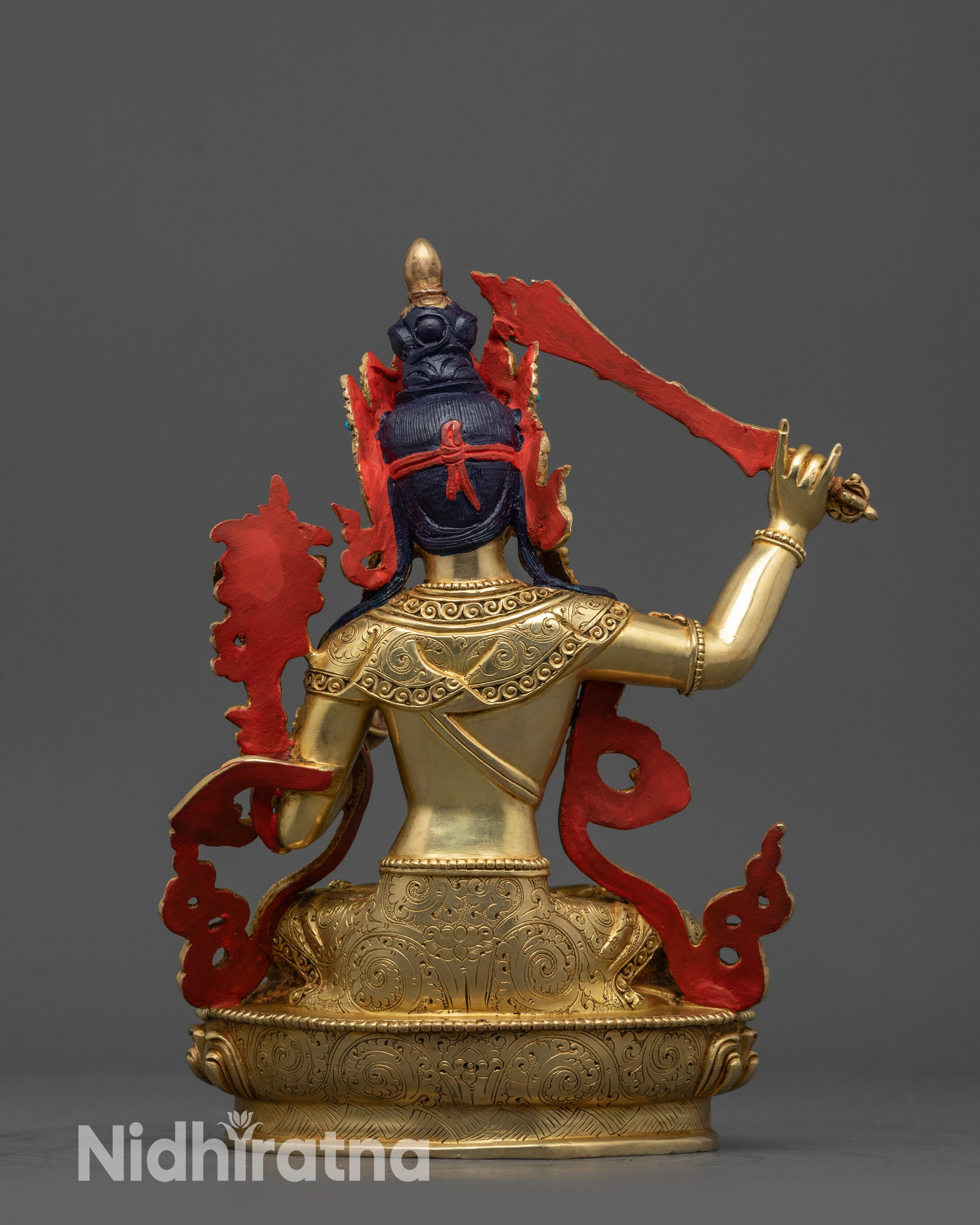 back view Himalayan Manjushri Statue showing detailed robe patterns and lotus base