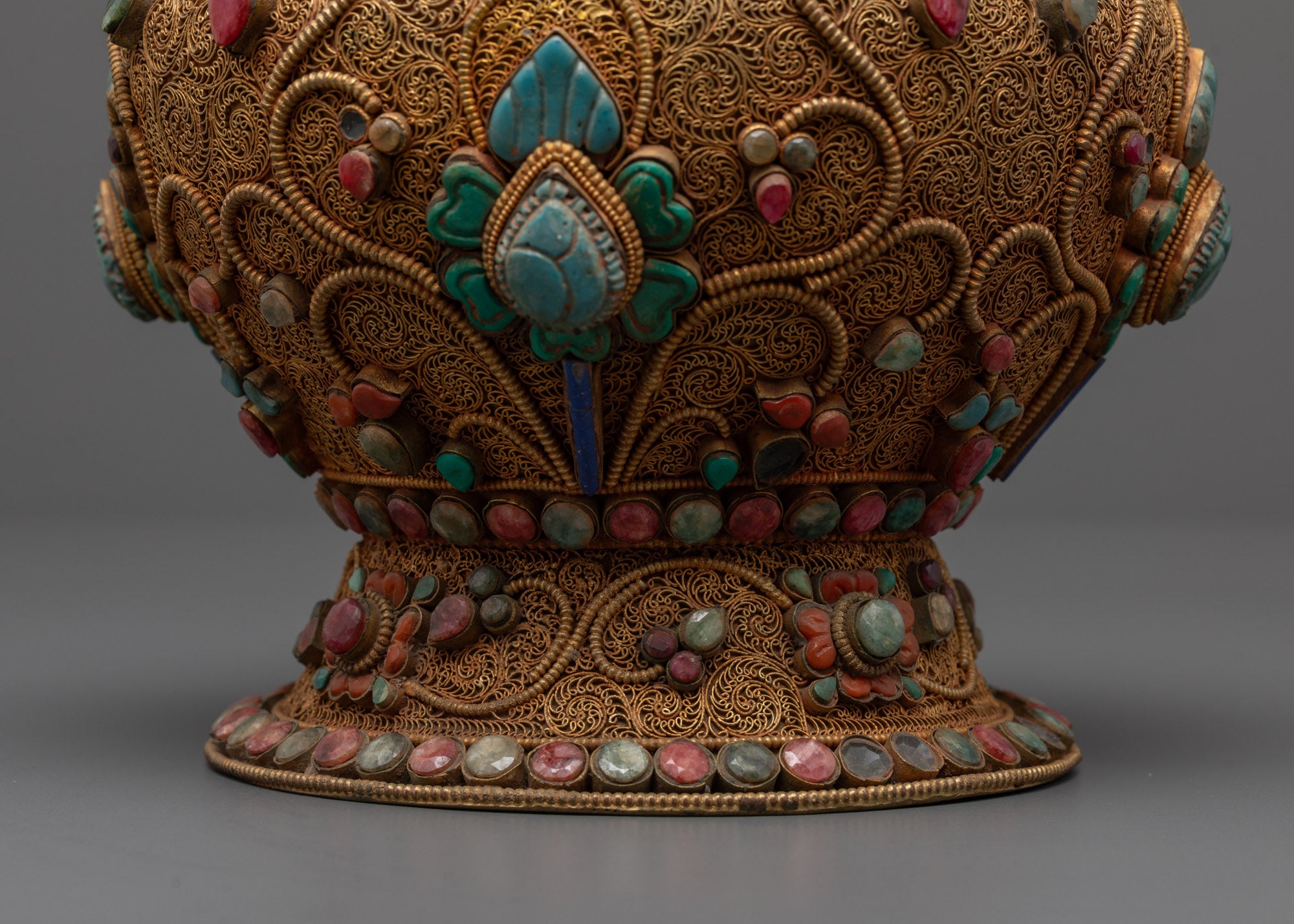 back view Tibetan rice pot gold-plated finish with intricate filigree and gemstone adornments