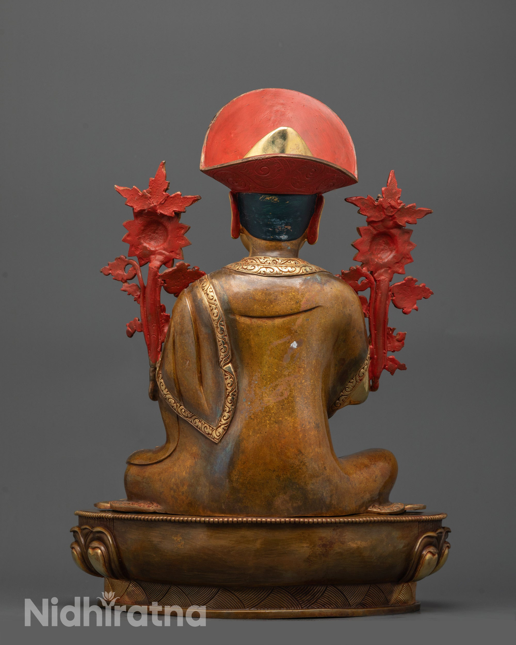 back view highlighting robe details and fire-gilded body of Nyamme Sherab Gyaltsen Statue