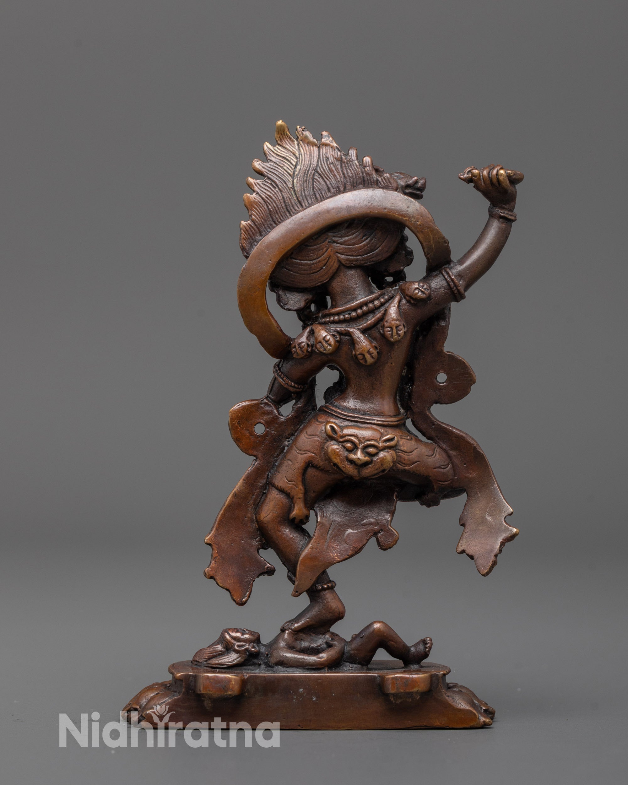 back view of dorje phagmo statue highlighting oxidized finish and detailed sculpting work