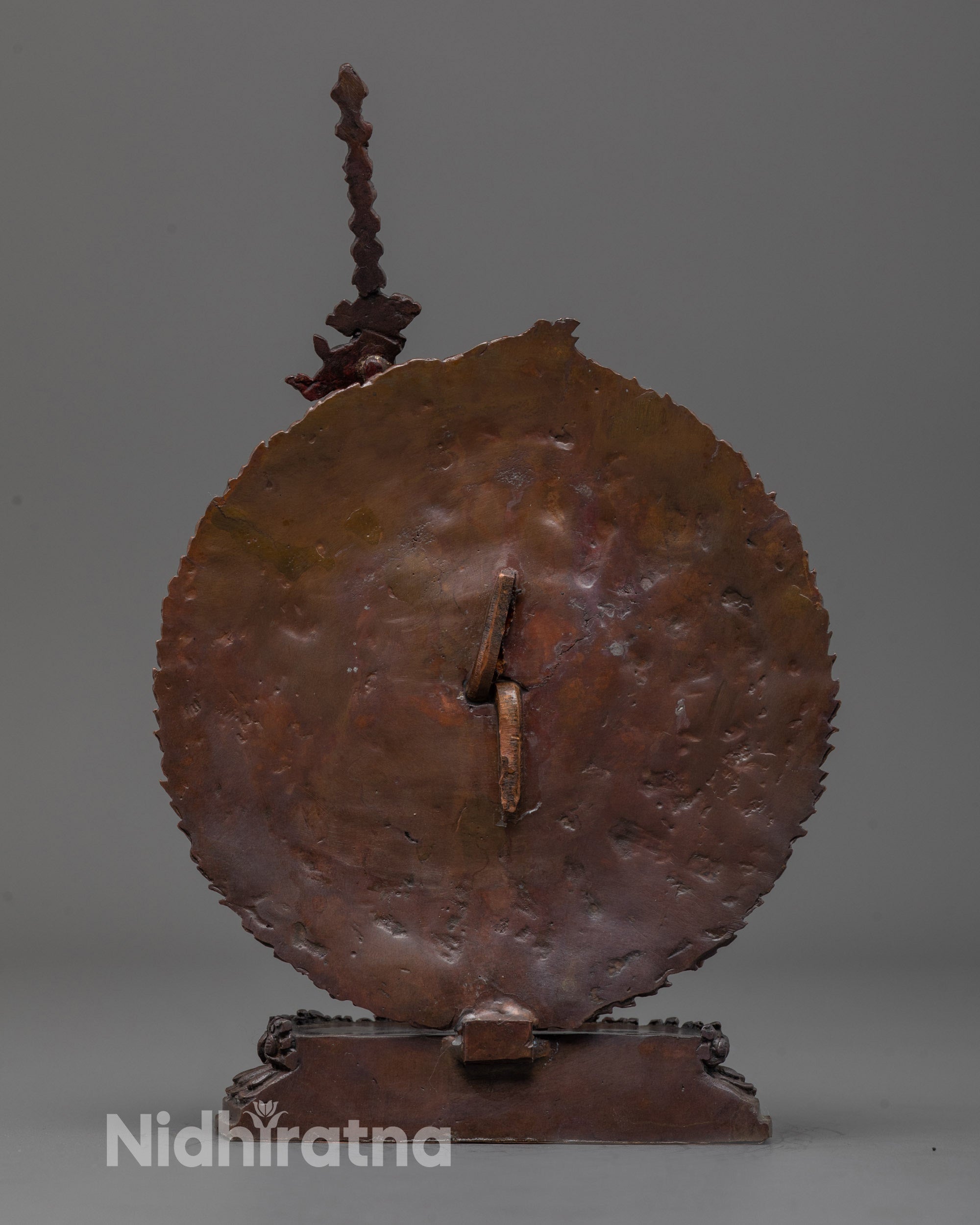 back view of oxidized Flying Vajrayogini statue showing detailed carving and robe folds