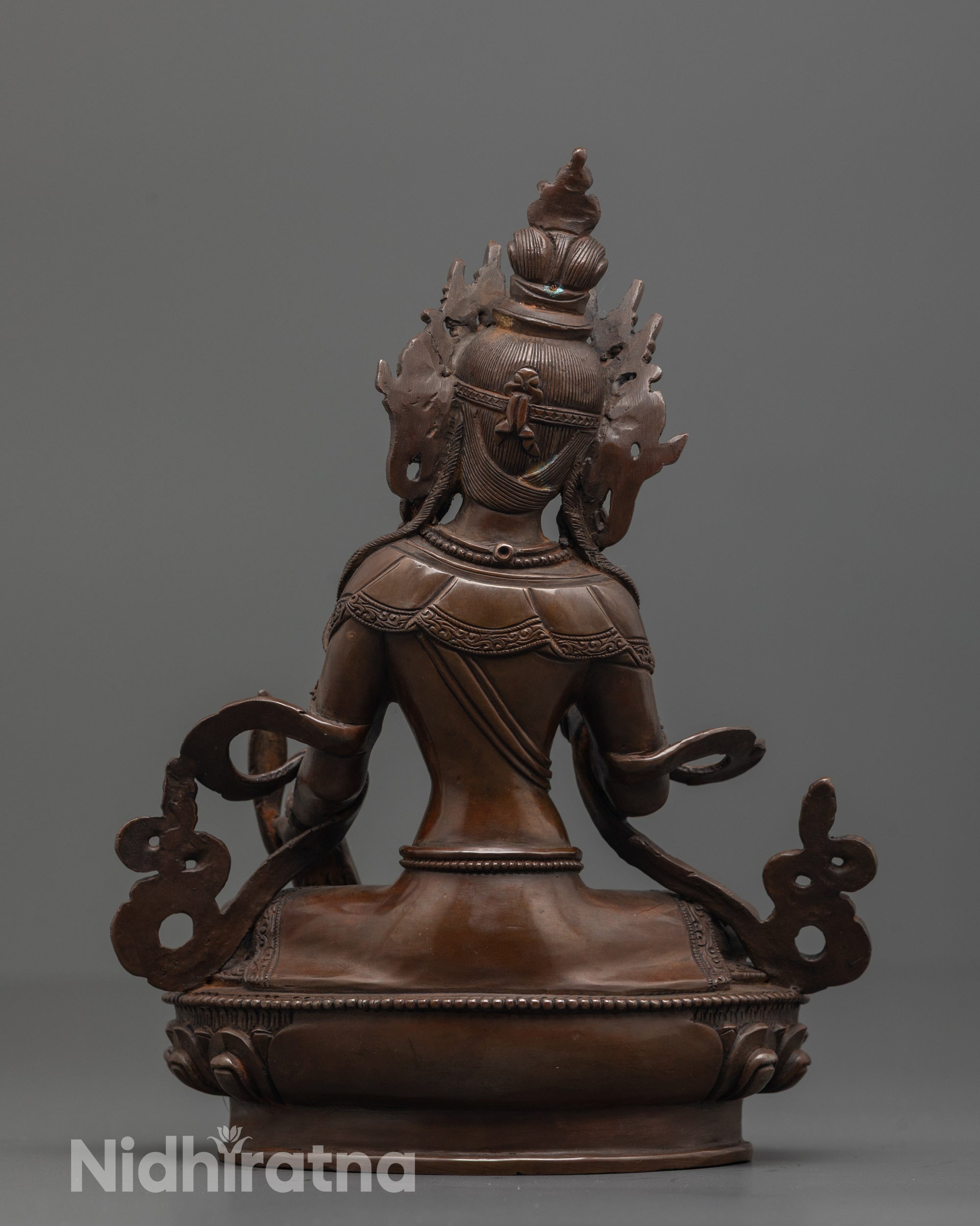 back view of oxidized copper ksitigarbha statue showing detailed robe patterns