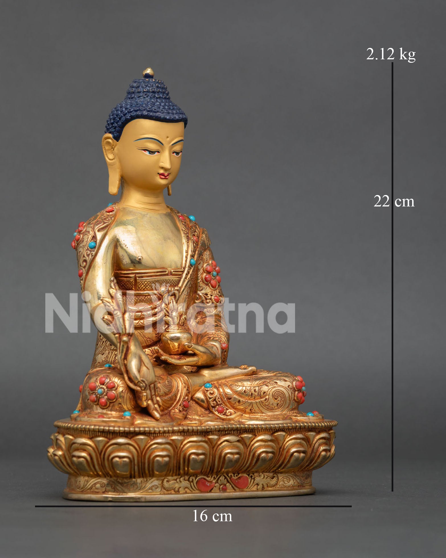 Bhaisajyaguru Medicine Buddha sculpture with gold painted face holding healing nectar bowl and Myrobalan plant