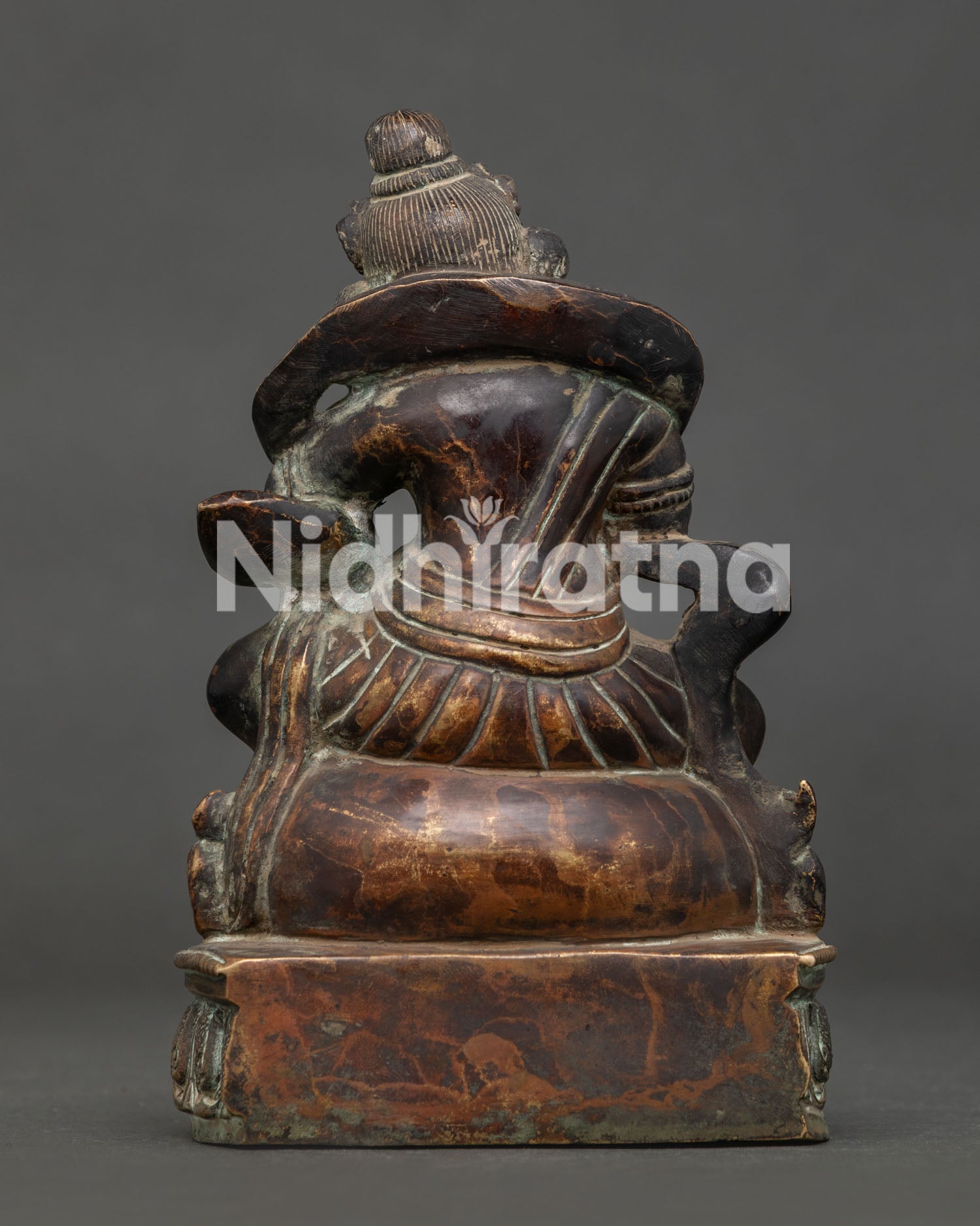 Black Dzambhala Statue Back View Antique Copper Himalayan Artistry.