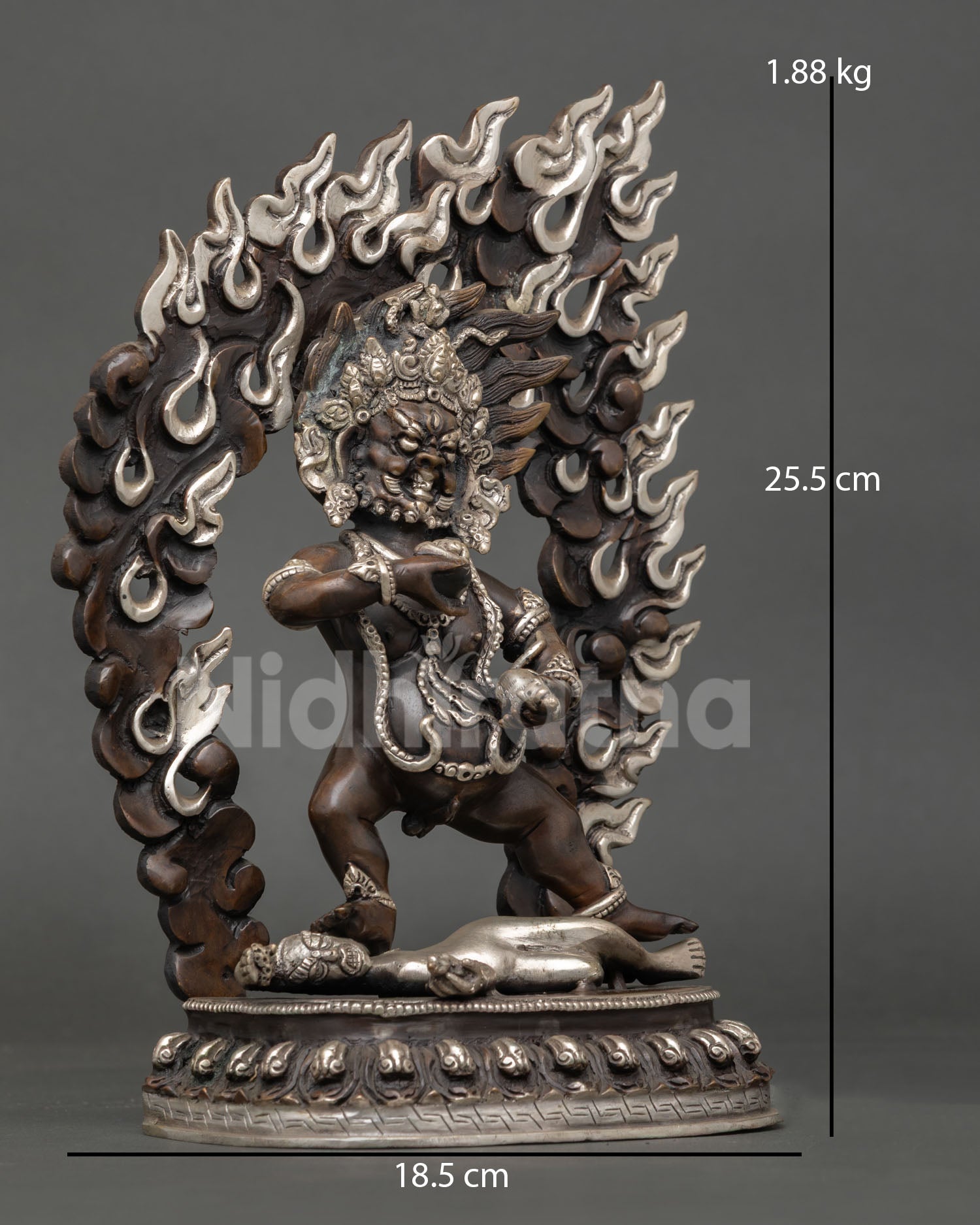 Black Dzambhala Statue right side view, flaming halo detail, oxidized copper, Tibetan deity Nepal