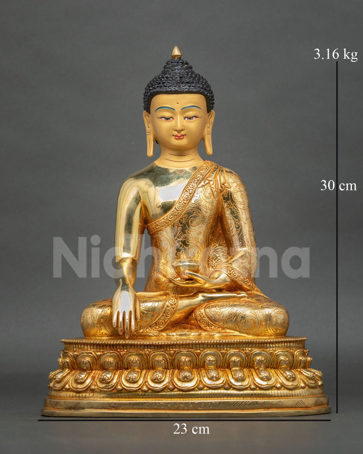 Buddha Shakyamuni Statue, handcrafted in Nepal, with 24K gold fire-gilding, a serene gold-painted face, and a lotus pedestal.