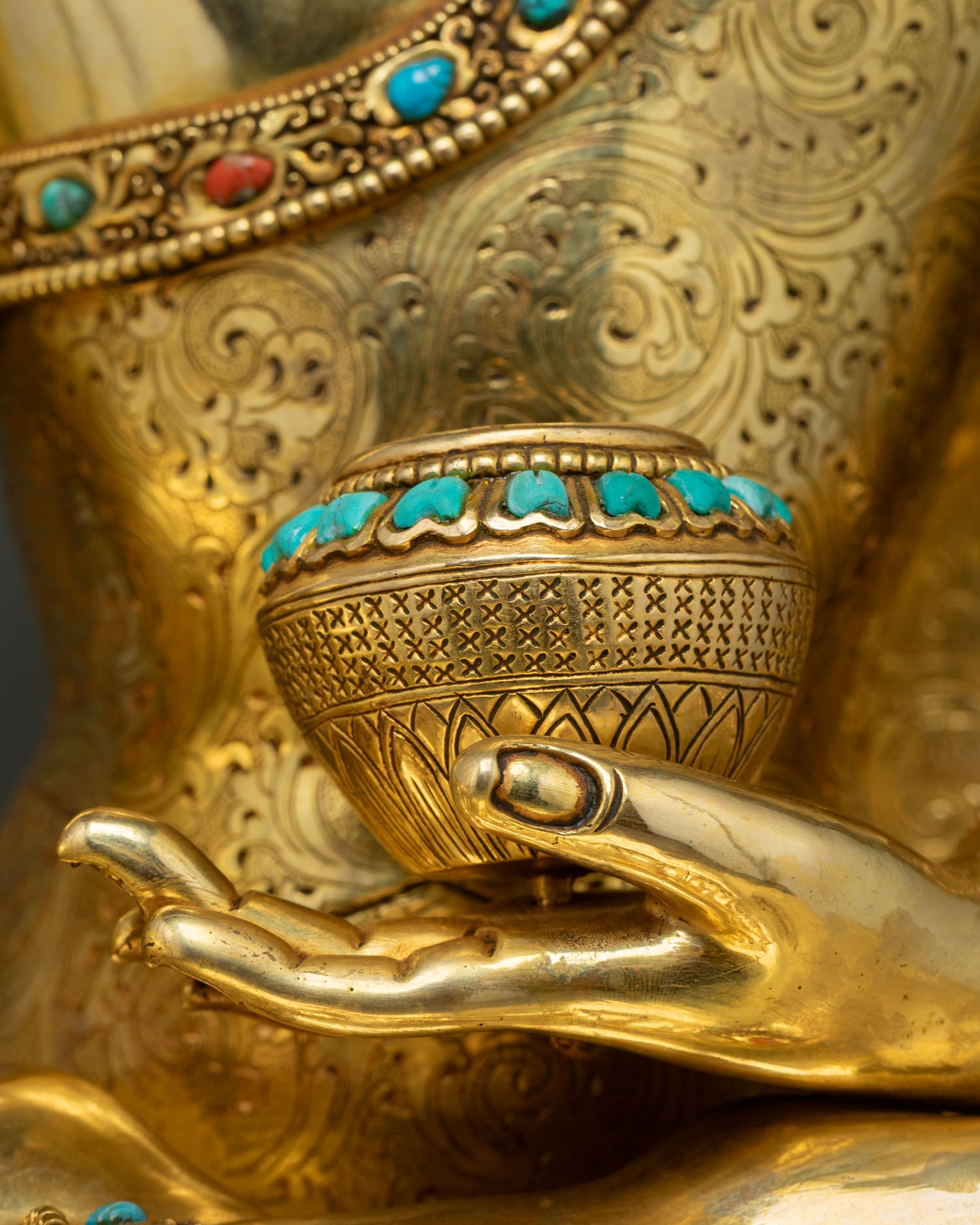 Buddha Shakyamuni Statue hands detail showing begging bowl in lap close-up