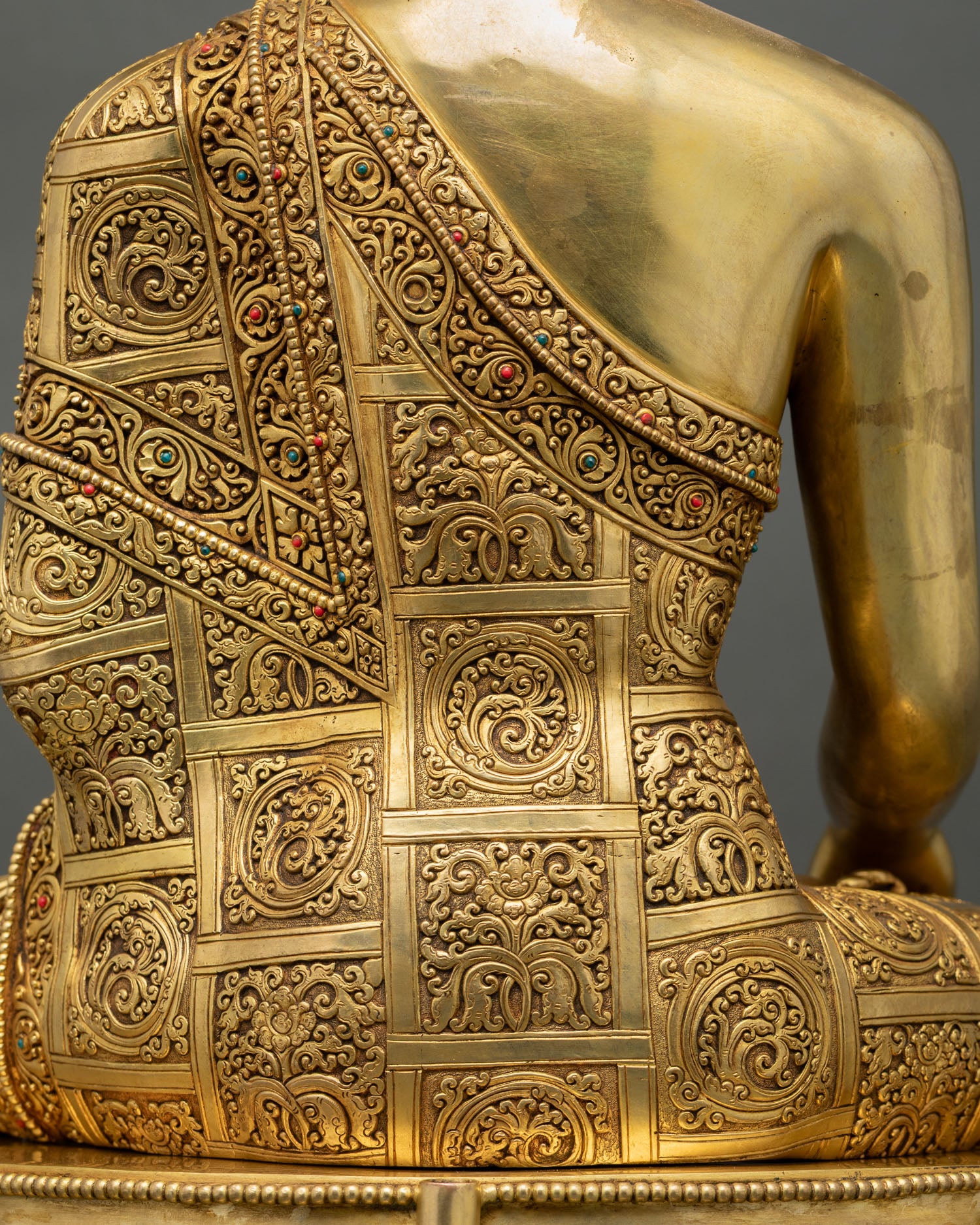 Buddha statue Monk's robe details, embroidered, gemstone inlays, floral patterns